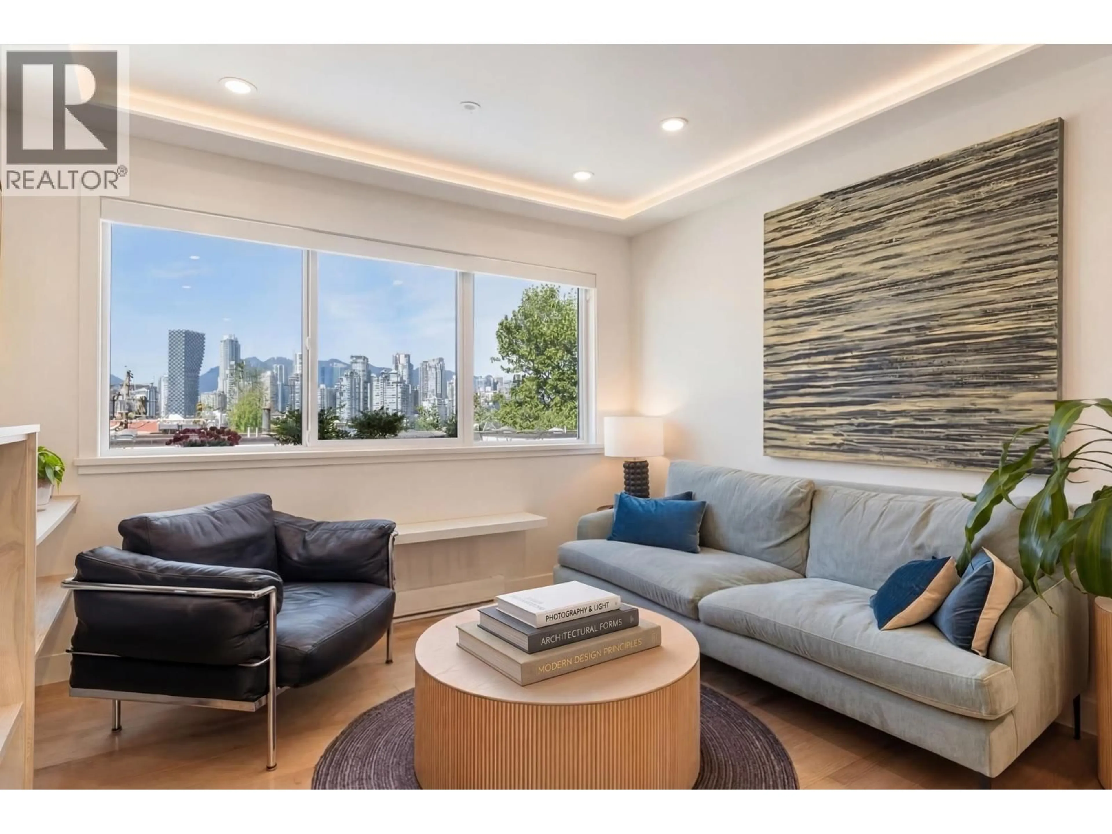Living room with furniture, wood/laminate floor for 11 - 1214 7TH AVENUE, Vancouver British Columbia V6H1B6