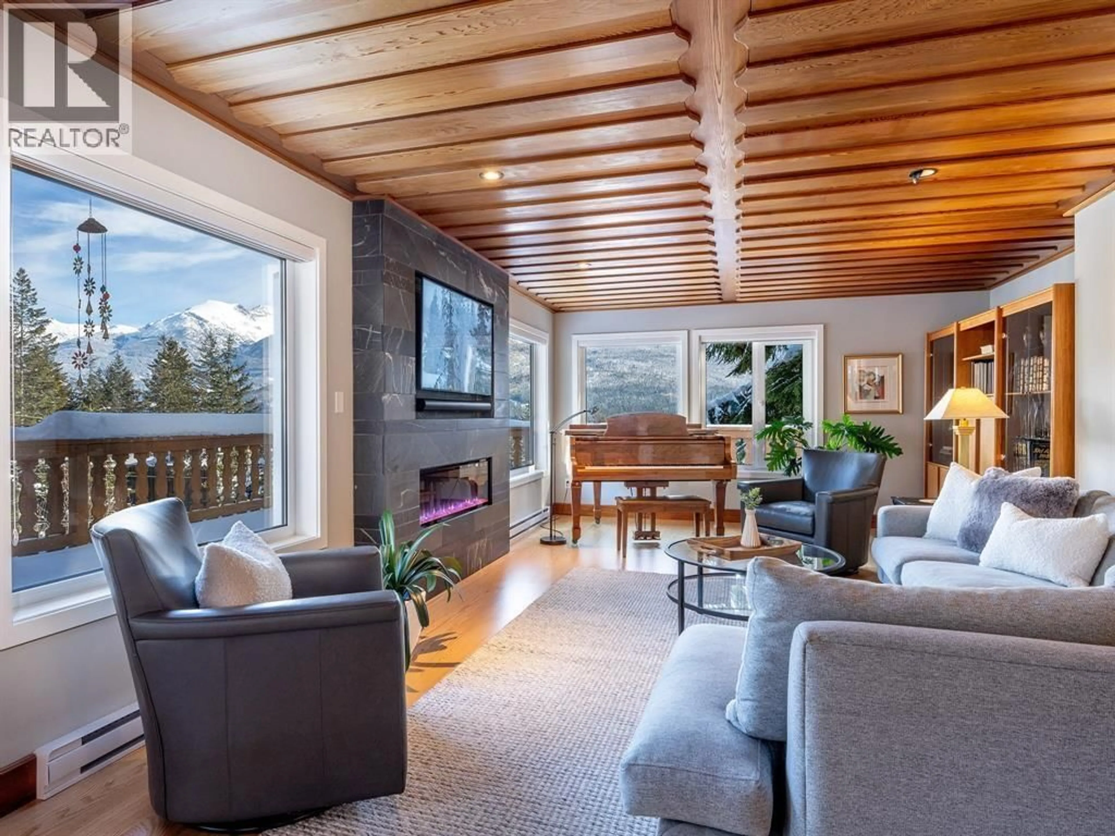 Living room with furniture, wood/laminate floor for 8512 DRIFTER WAY, Whistler British Columbia V8E0G2