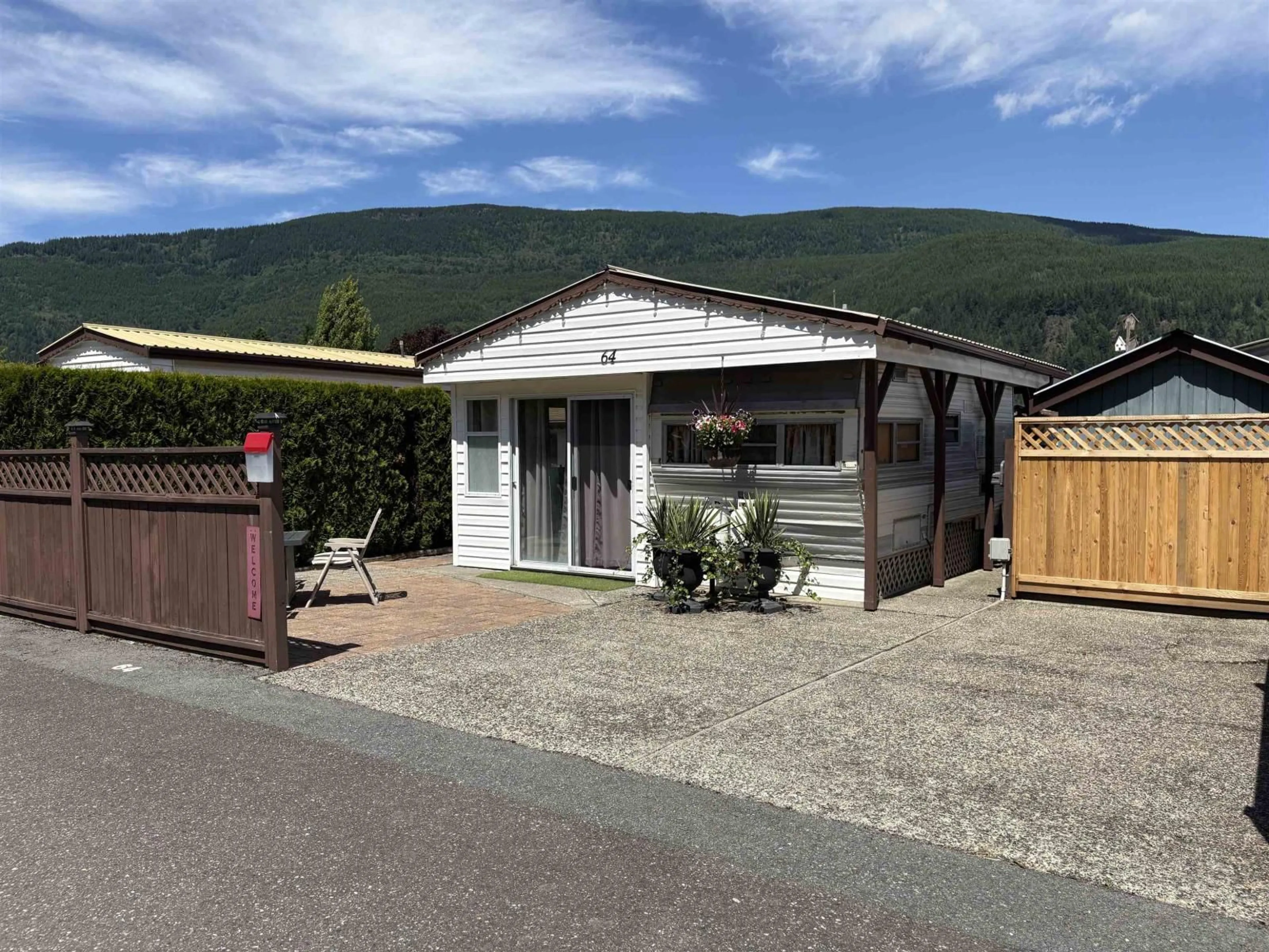 A pic from outside/outdoor area/front of a property/back of a property/a pic from drone, mountain view for 64 - 1436 FROST ROAD, Cultus Lake British Columbia V2R4X8