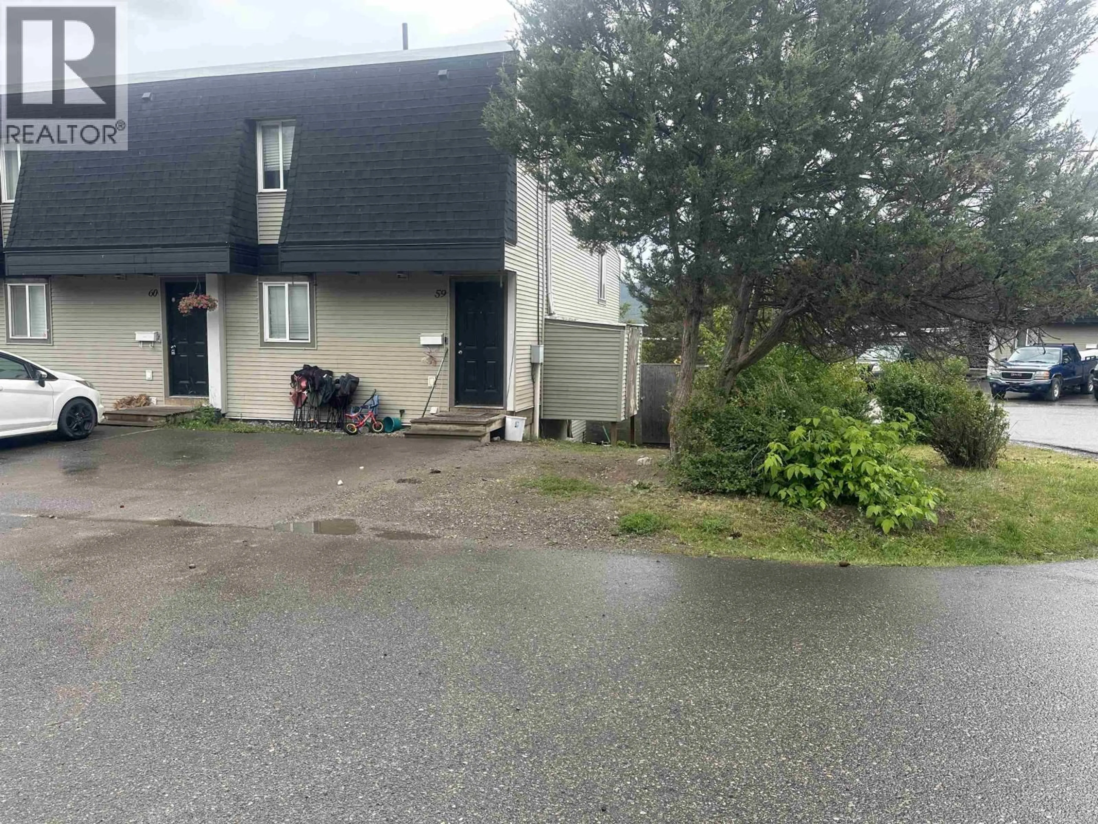 A pic from outside/outdoor area/front of a property/back of a property/a pic from drone, street for 59 - 605 CARSON DRIVE, Williams Lake British Columbia V0K2G0