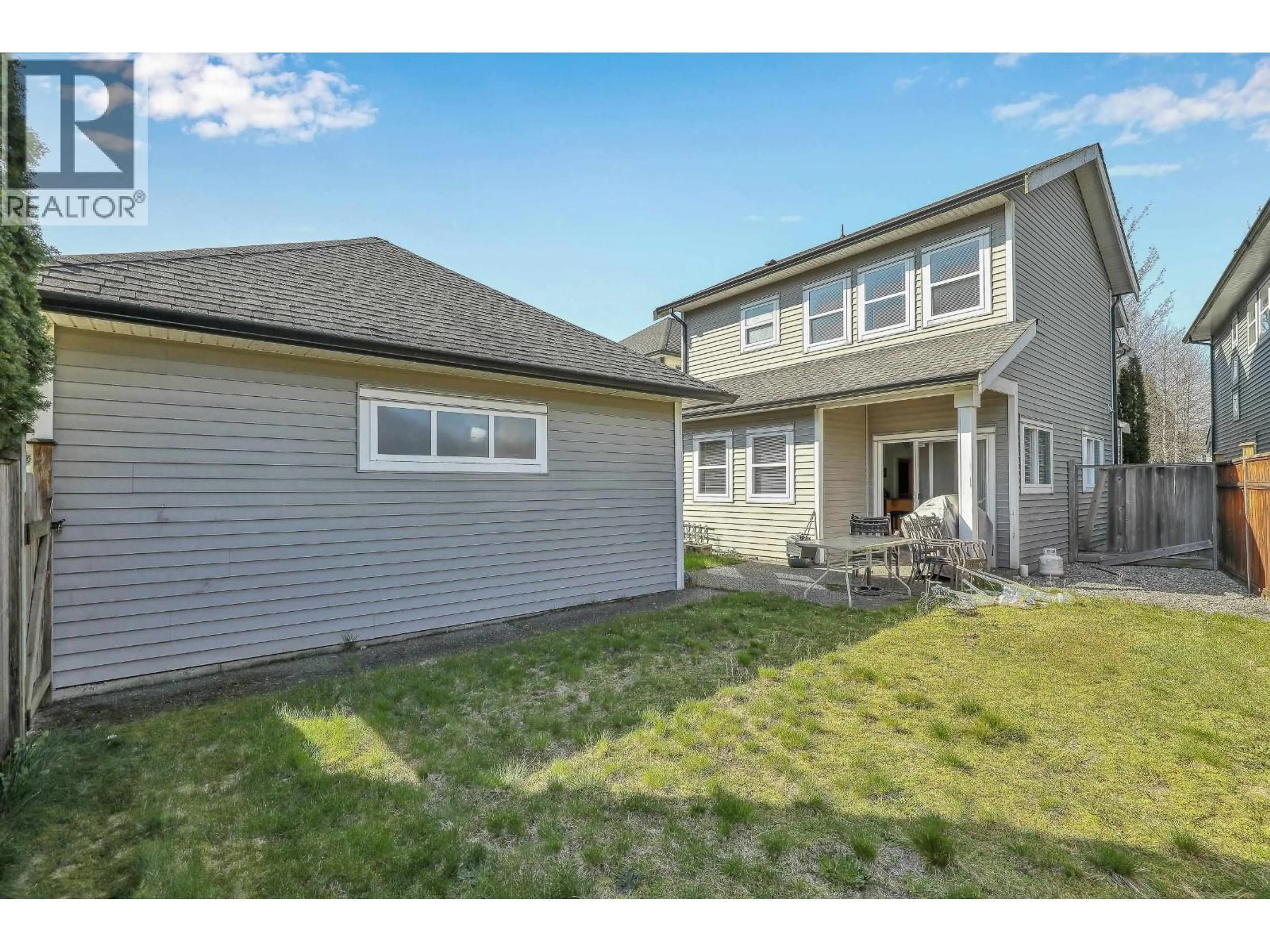 Home with vinyl exterior material, street for 19590 SHINGLE BOLT CRESCENT, Pitt Meadows British Columbia V3Y2W7
