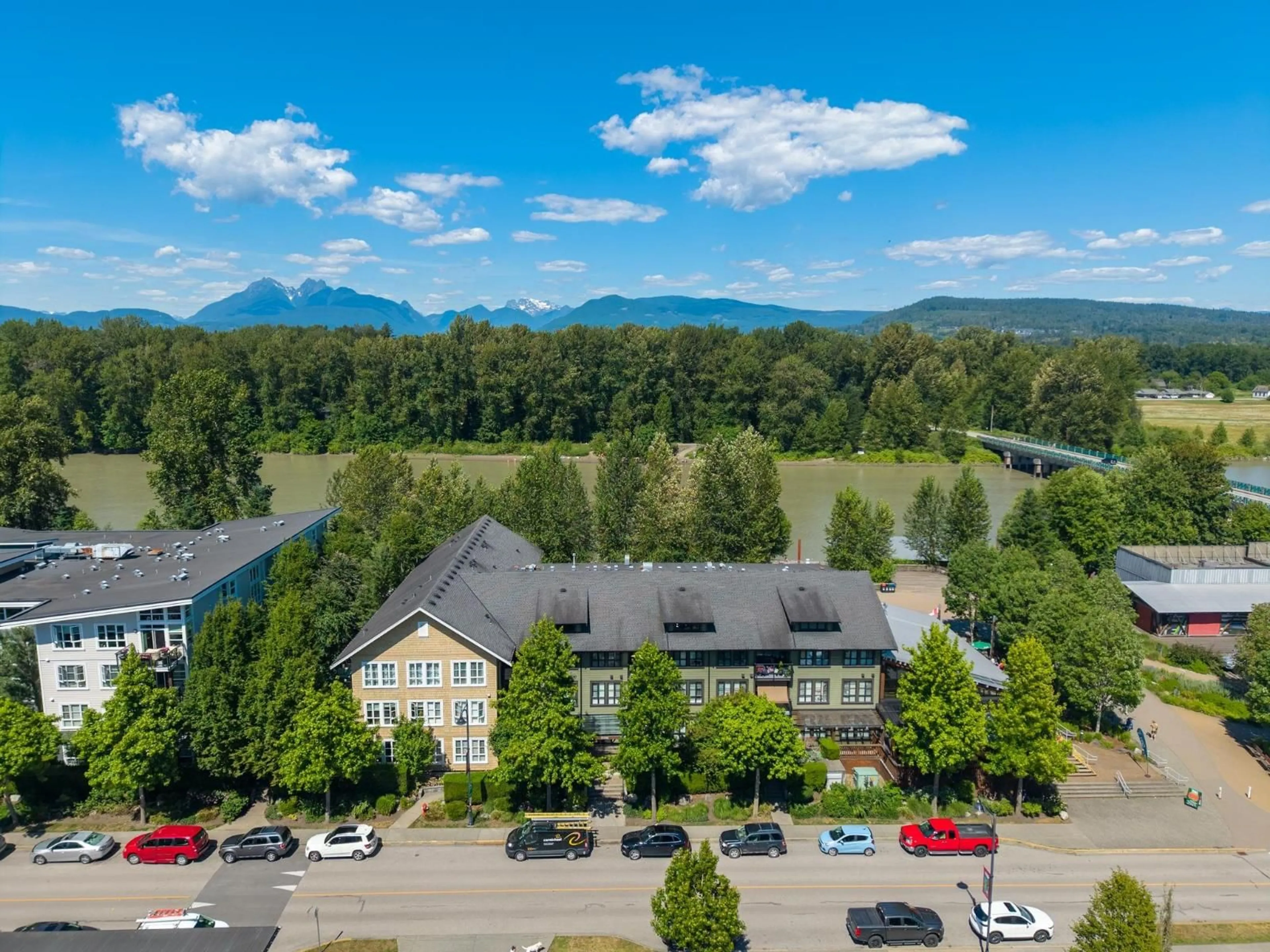 A pic from outside/outdoor area/front of a property/back of a property/a pic from drone, mountain view for 208 - 23285 BILLY BROWN ROAD, Langley British Columbia V1M0C8