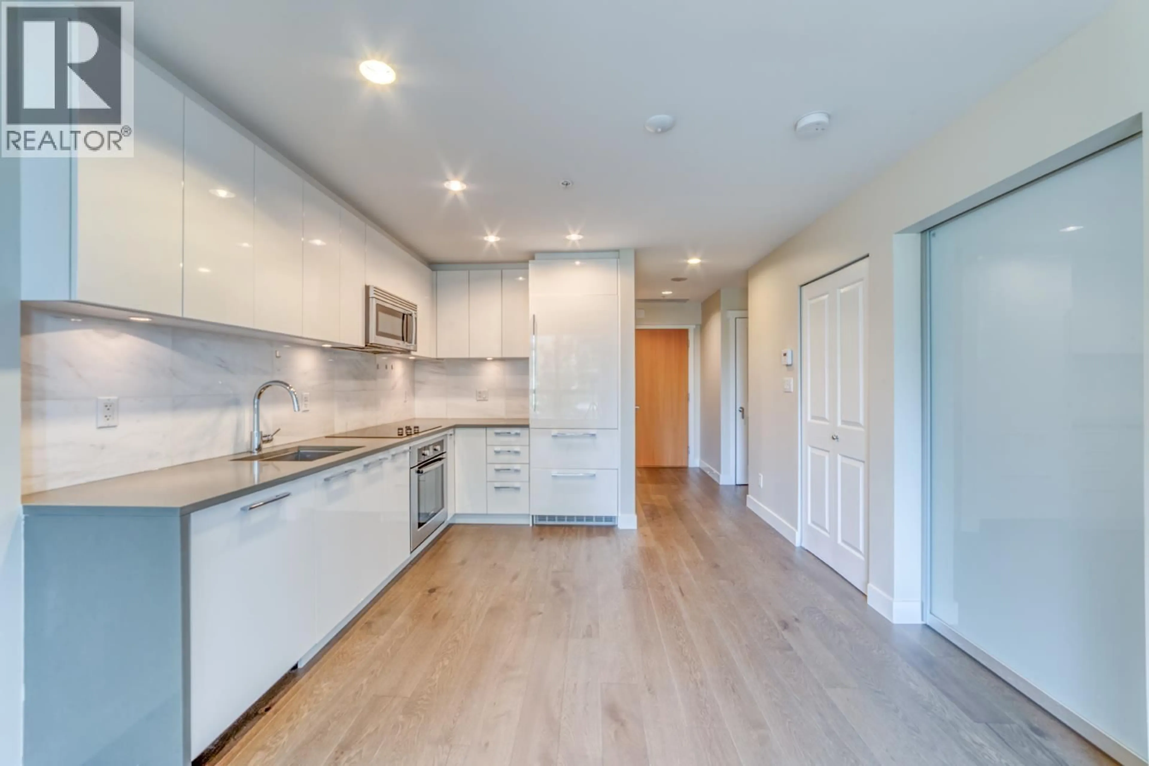 Open concept kitchen, unknown for 506 - 5728 BERTON AVENUE, Vancouver British Columbia V6S0E5