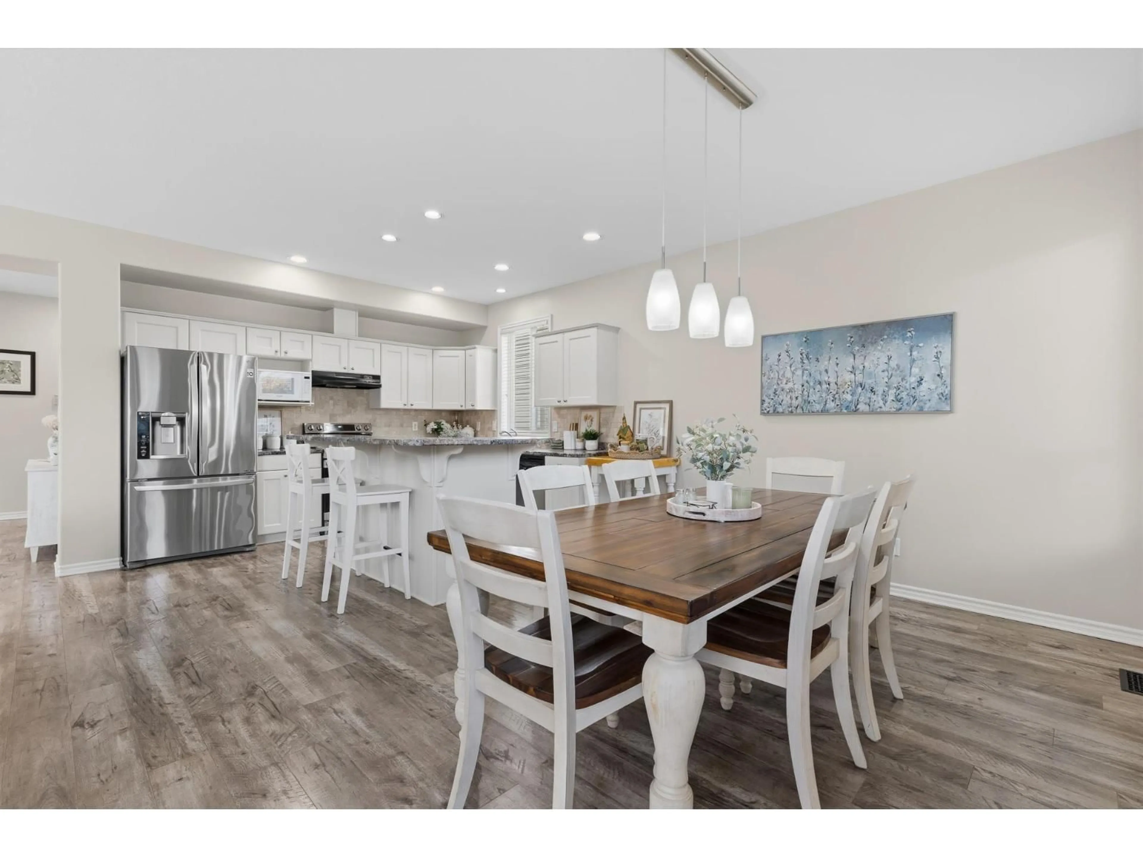 Open concept kitchen, wood/laminate floor for 14 - 5545 PEACH ROAD, Chilliwack British Columbia V2R5Y5