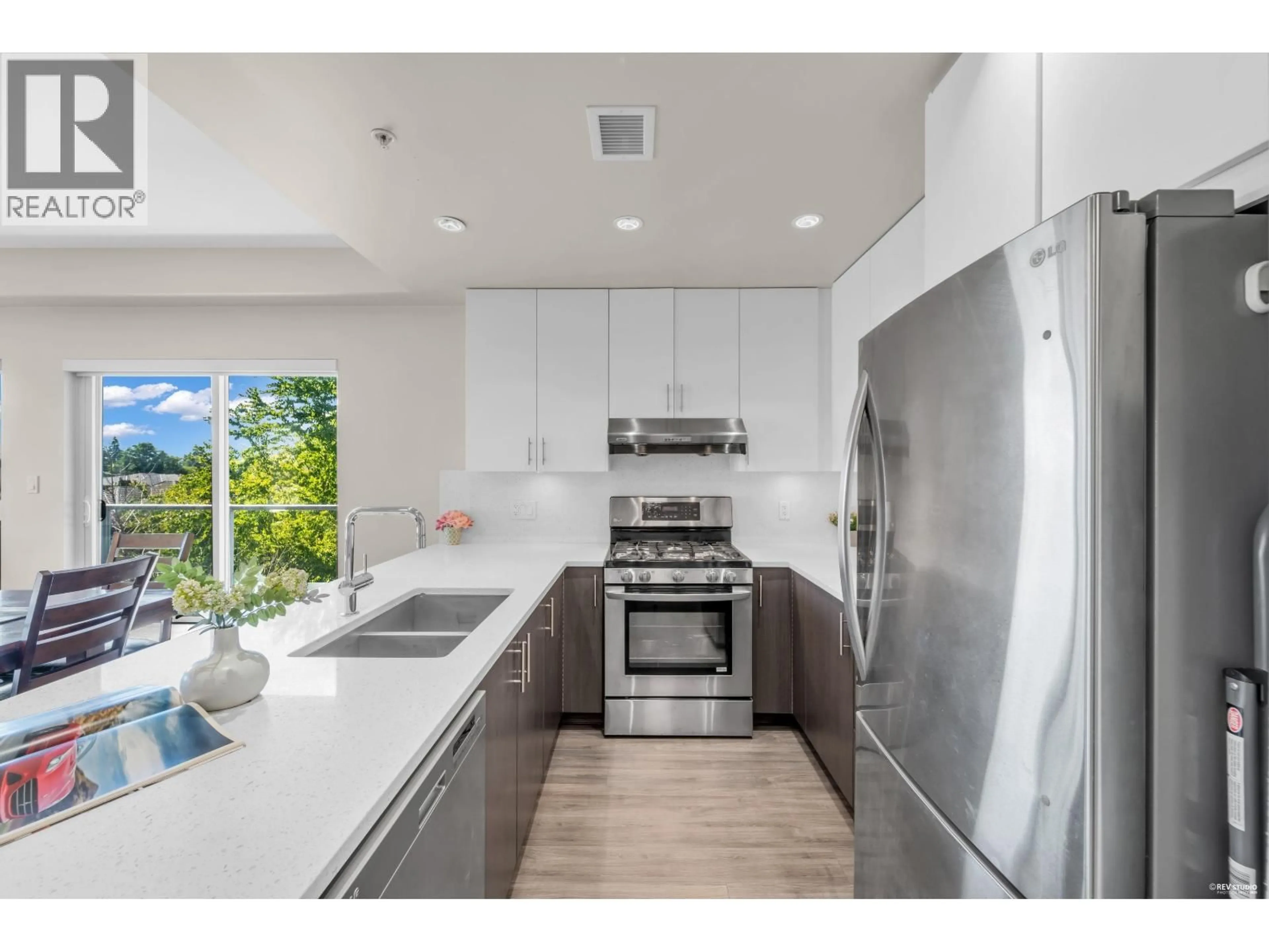 Open concept kitchen, ceramic/tile floor for 312 - 6011 NO. 1 ROAD, Richmond British Columbia V7C1T4