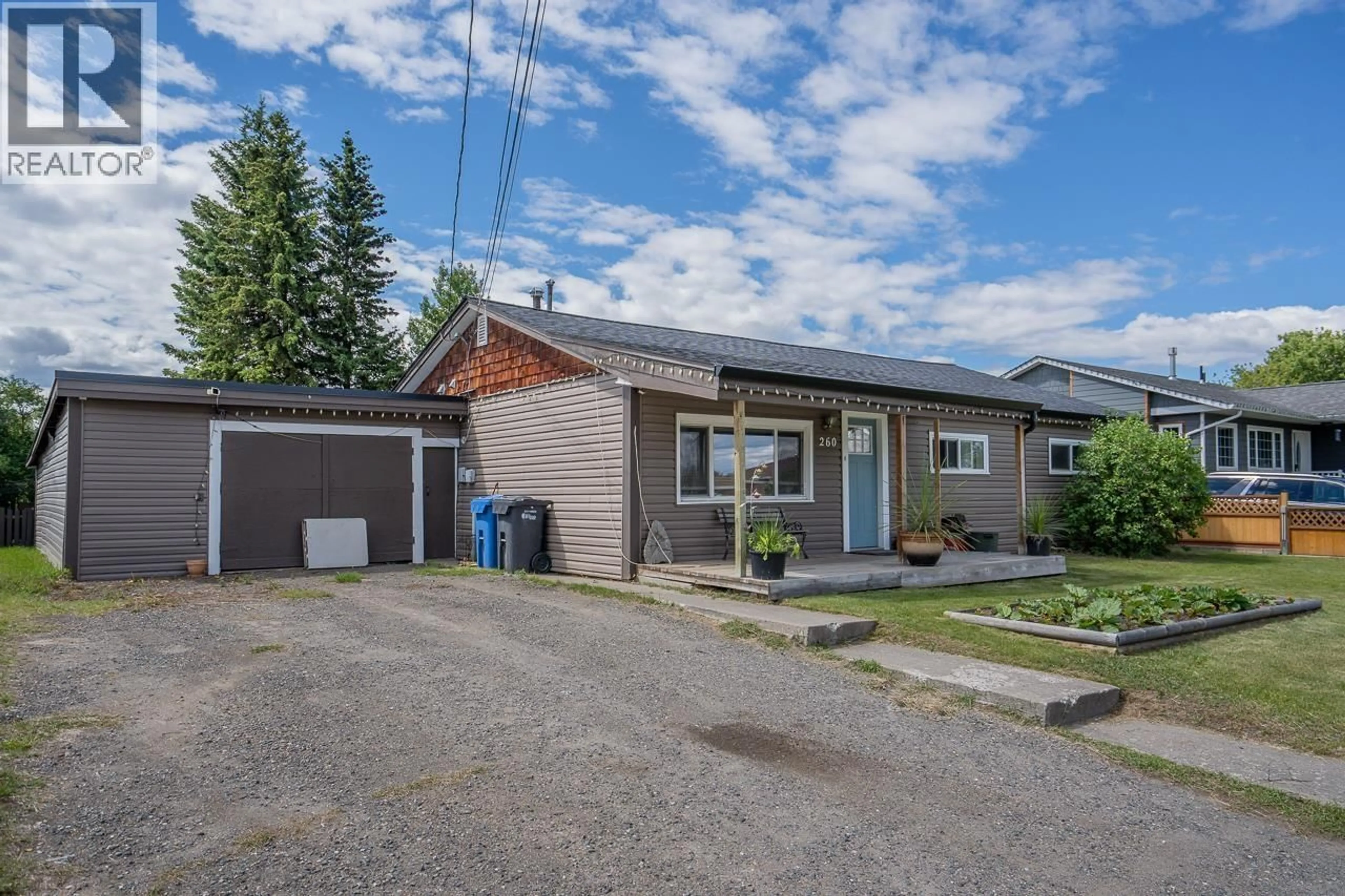 A pic from outside/outdoor area/front of a property/back of a property/a pic from drone, street for 260 DOGWOOD AVENUE, 100 Mile House British Columbia V0K2E0