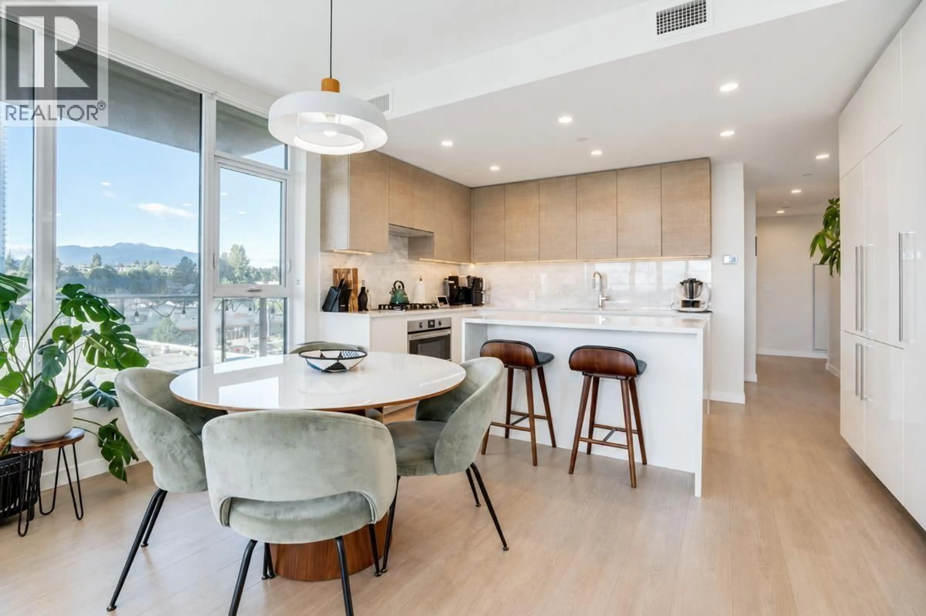 Open concept kitchen, unknown for 705 - 4168 LOUGHEED HIGHWAY, Burnaby British Columbia V5C6A7