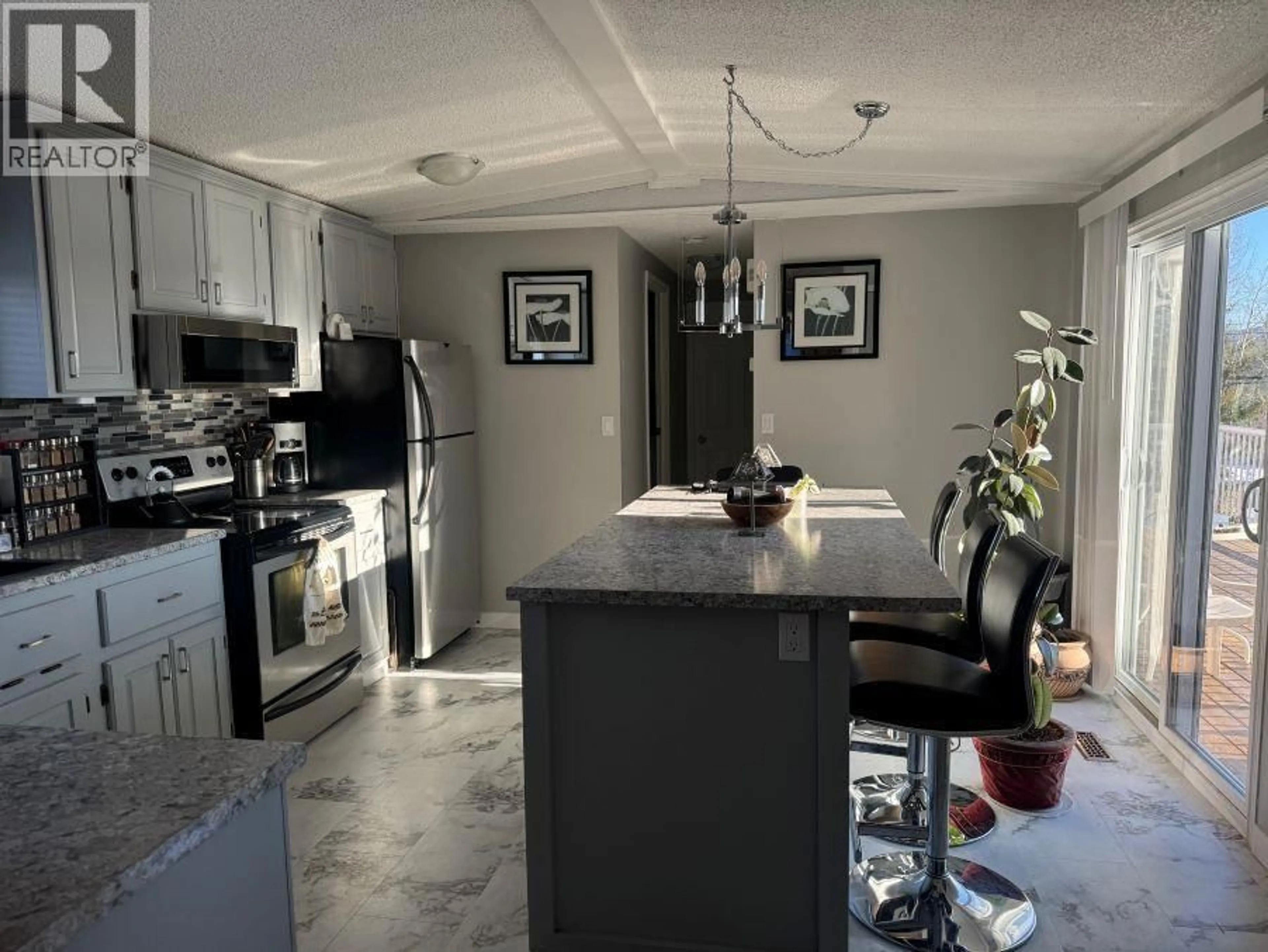 Open concept kitchen, ceramic/tile floor for 301 BLACKBURN ROAD, Prince George British Columbia V2N6G1