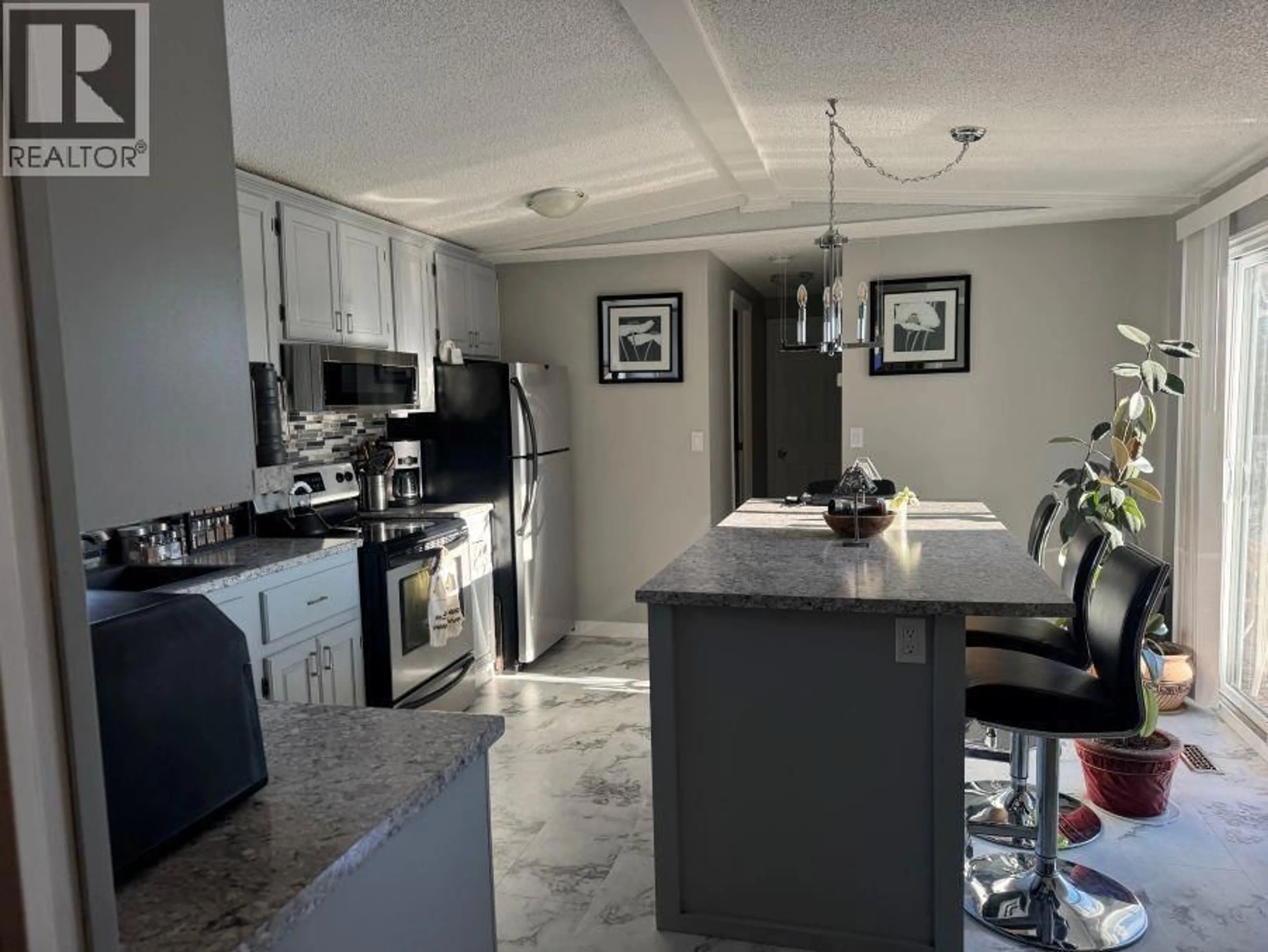 Open concept kitchen, ceramic/tile floor for 301 BLACKBURN ROAD, Prince George British Columbia V2N6G1