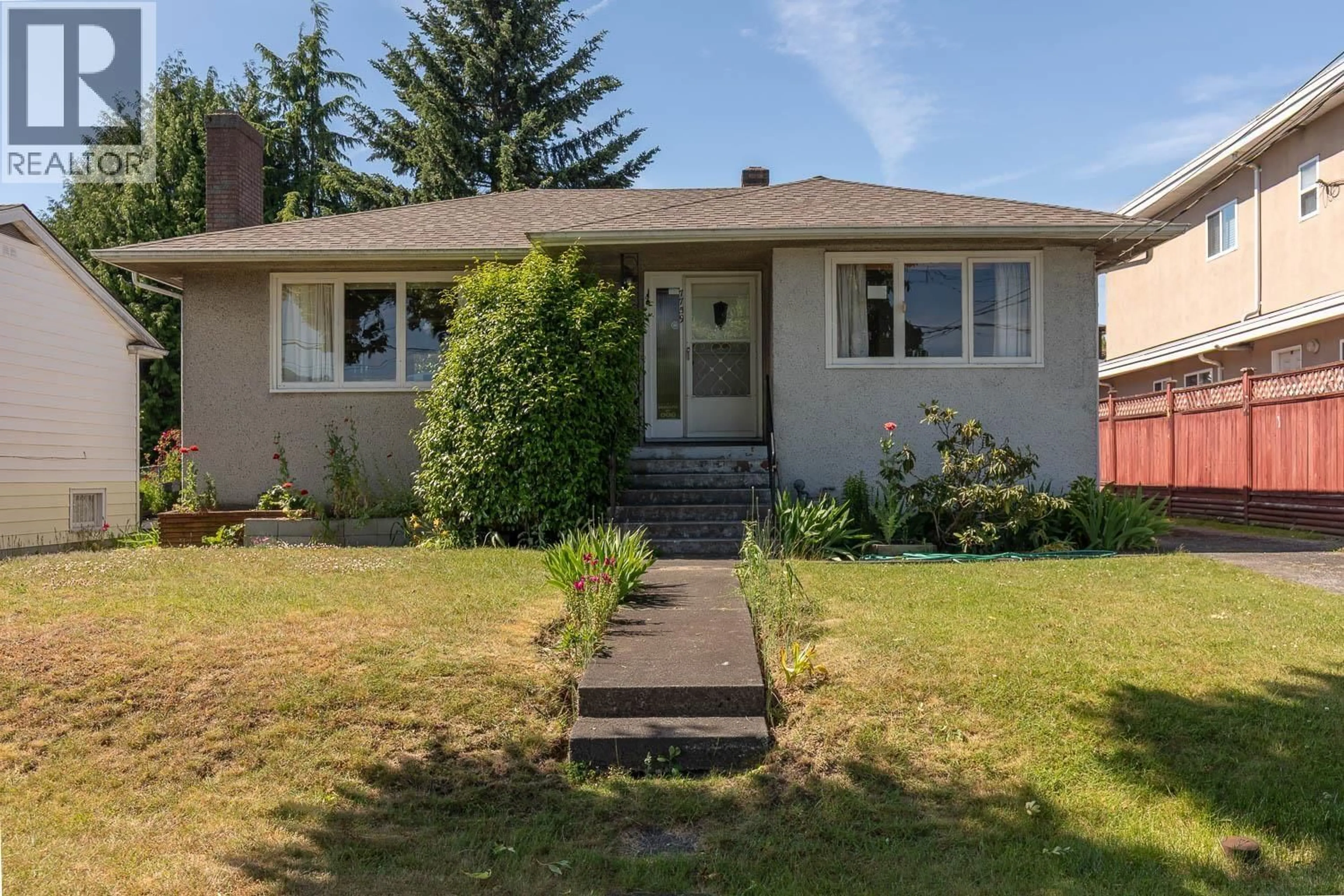 Home with vinyl exterior material, street for 7759 14TH AVENUE, Burnaby British Columbia V3N2A8