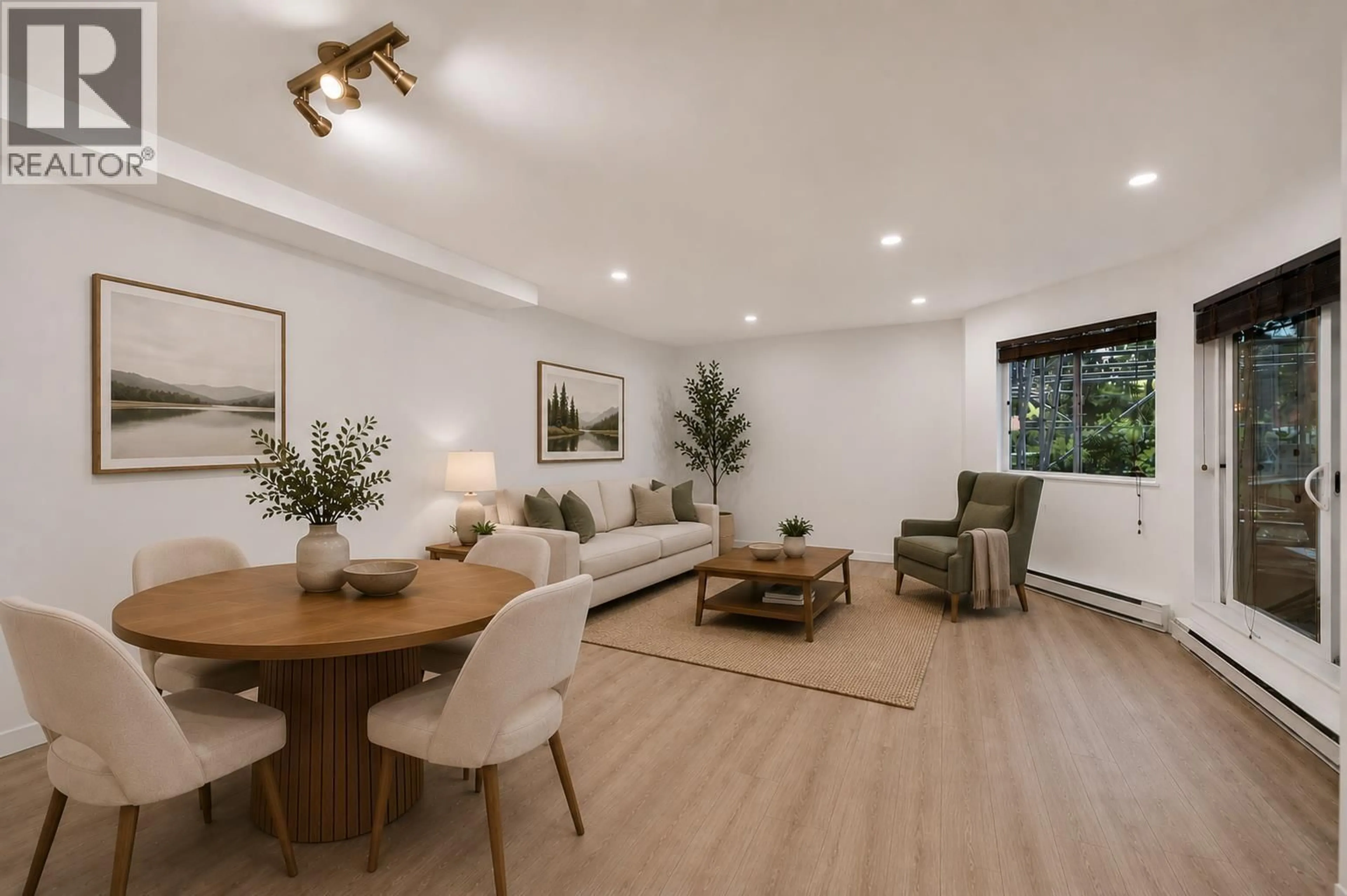 Living room with furniture, wood/laminate floor for 103 - 1365 4TH AVENUE, Vancouver British Columbia V6H3Y8