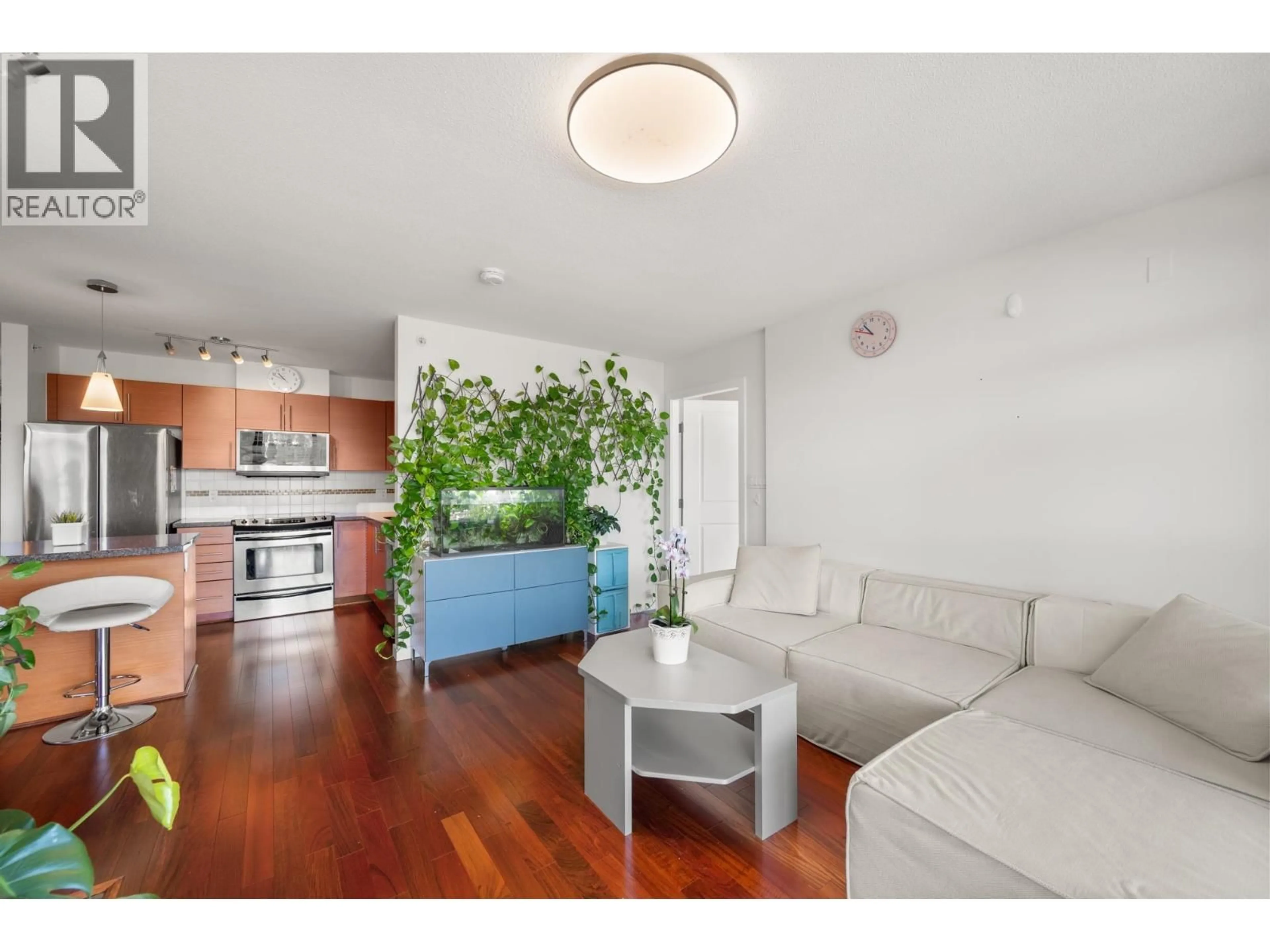 Living room with furniture, wood/laminate floor for 1801 - 5611 GORING STREET, Burnaby British Columbia V5B0A3