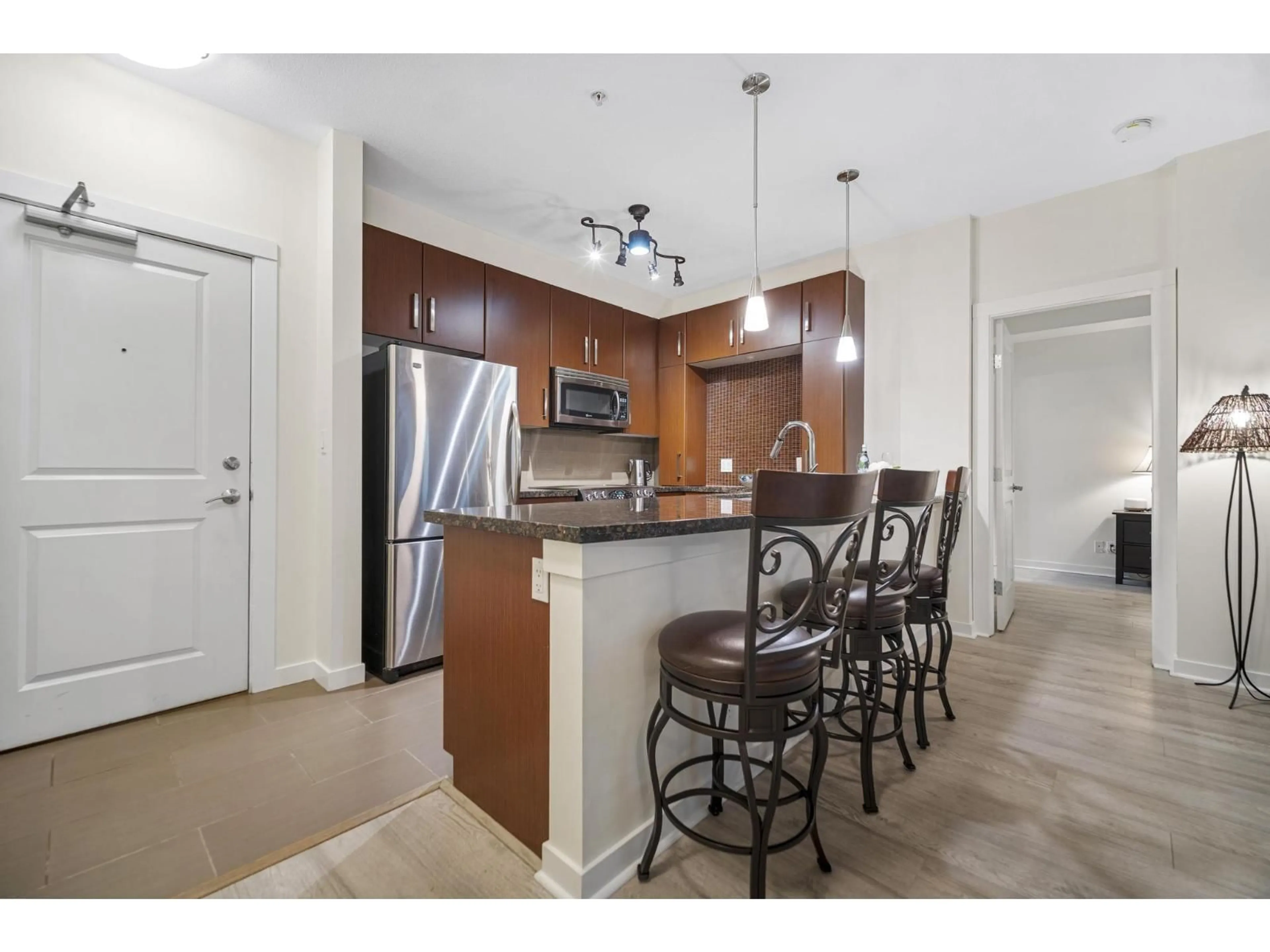 Open concept kitchen, unknown for 103 - 15168 19 AVENUE, Surrey British Columbia V4A0A5