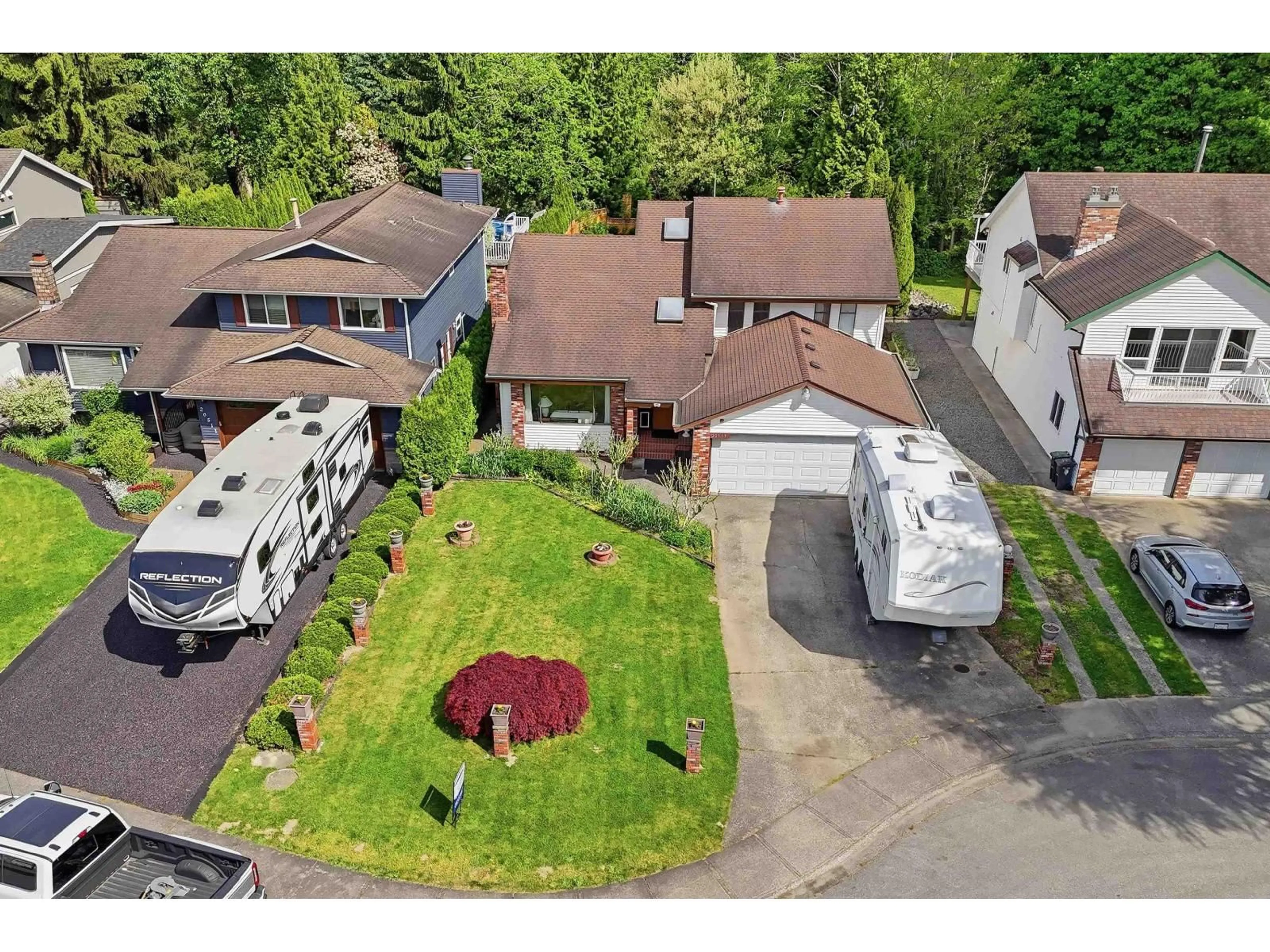 A pic from outside/outdoor area/front of a property/back of a property/a pic from drone, street for 20519 TELEGRAPH TRAIL, Langley British Columbia V1M1A7