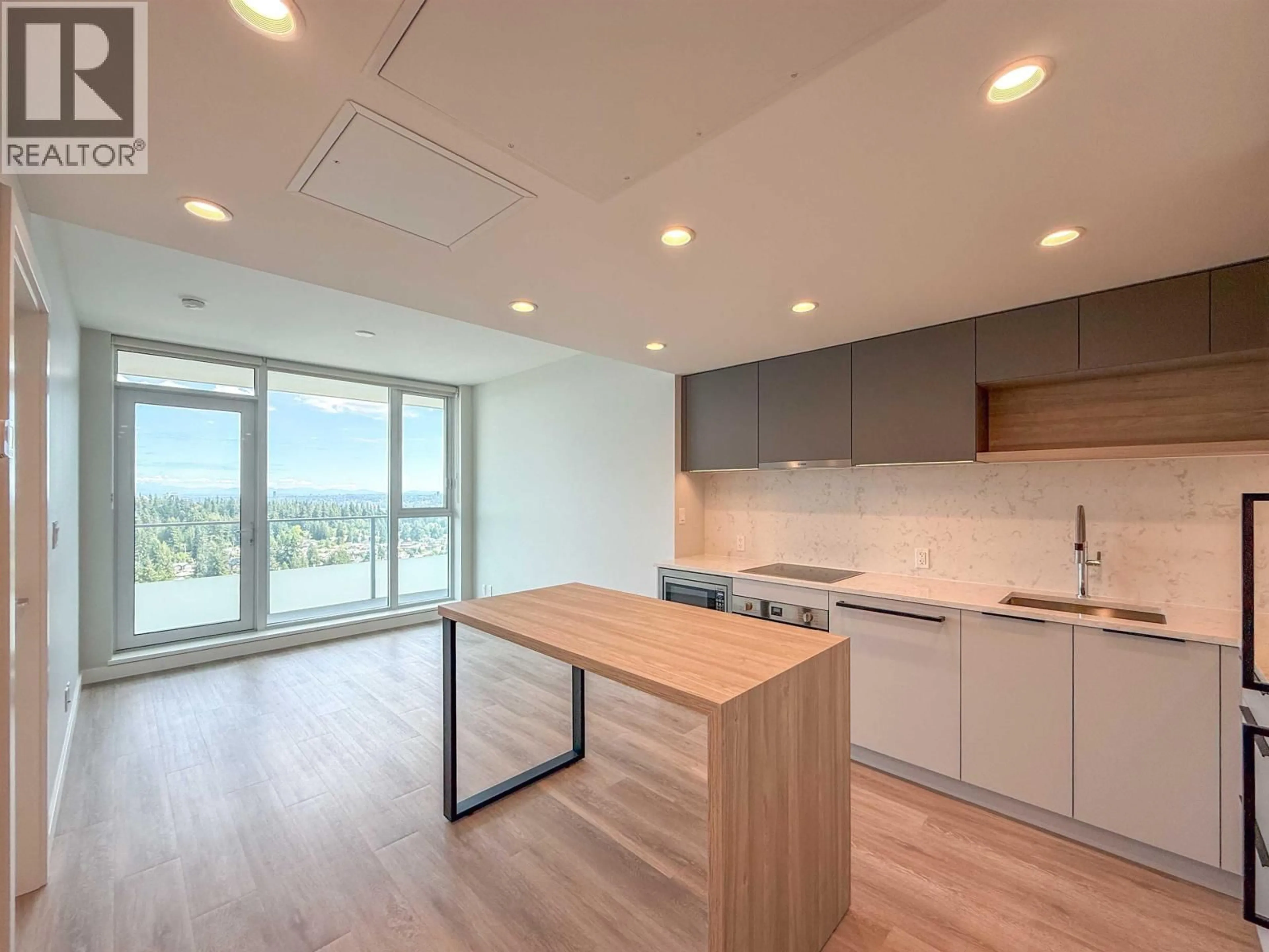 Open concept kitchen, wood/laminate floor for 3102 - 567 EMERSON STREET, Coquitlam British Columbia V3J0M8