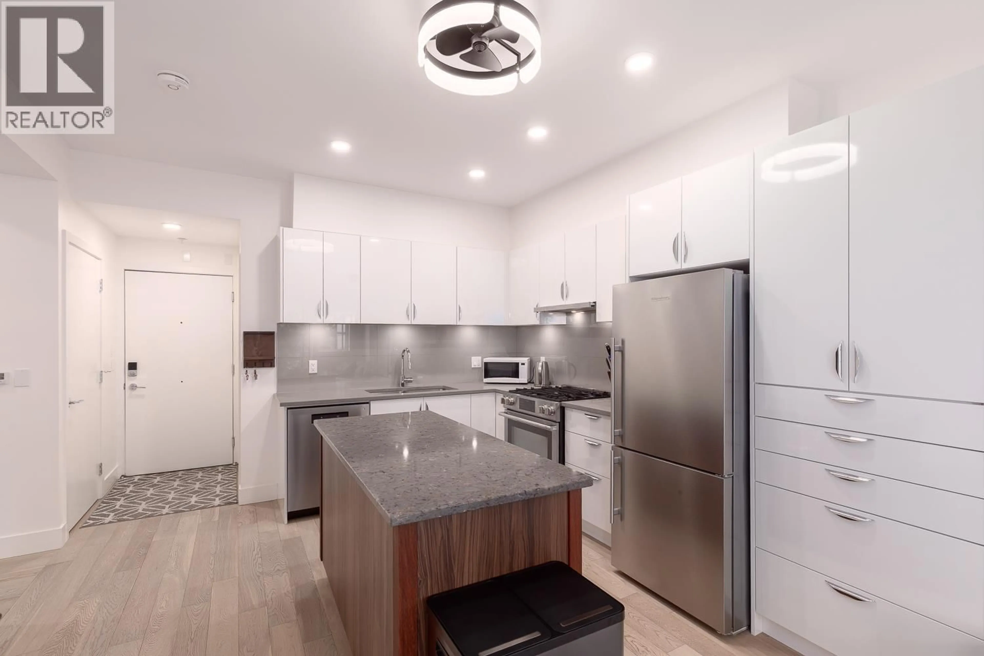 Open concept kitchen, unknown for 404 - 2666 DUKE STREET, Vancouver British Columbia V5R4S9