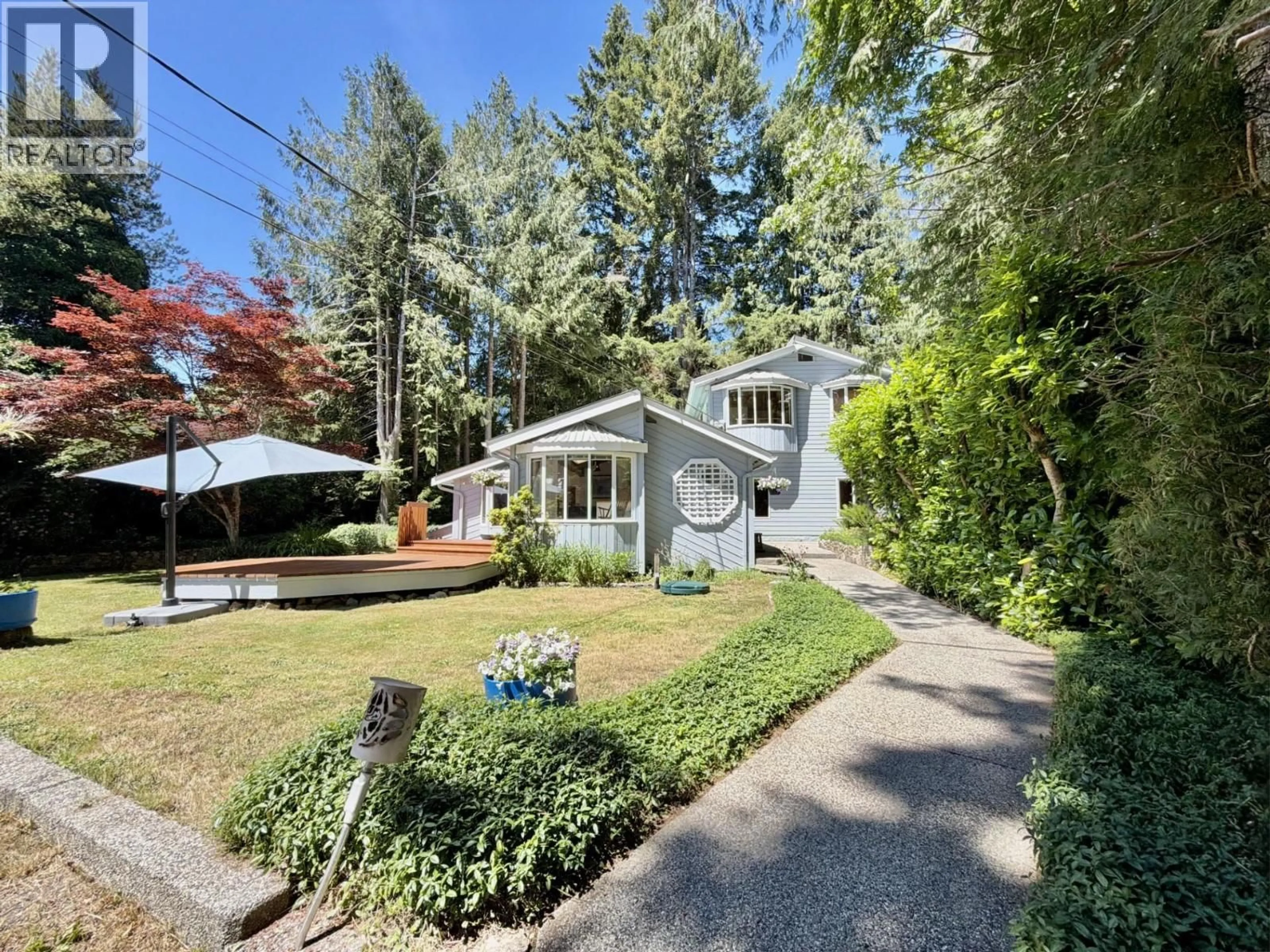 A pic from outside/outdoor area/front of a property/back of a property/a pic from drone, street for 3658 BEACH AVENUE, Roberts Creek British Columbia V0N2W2
