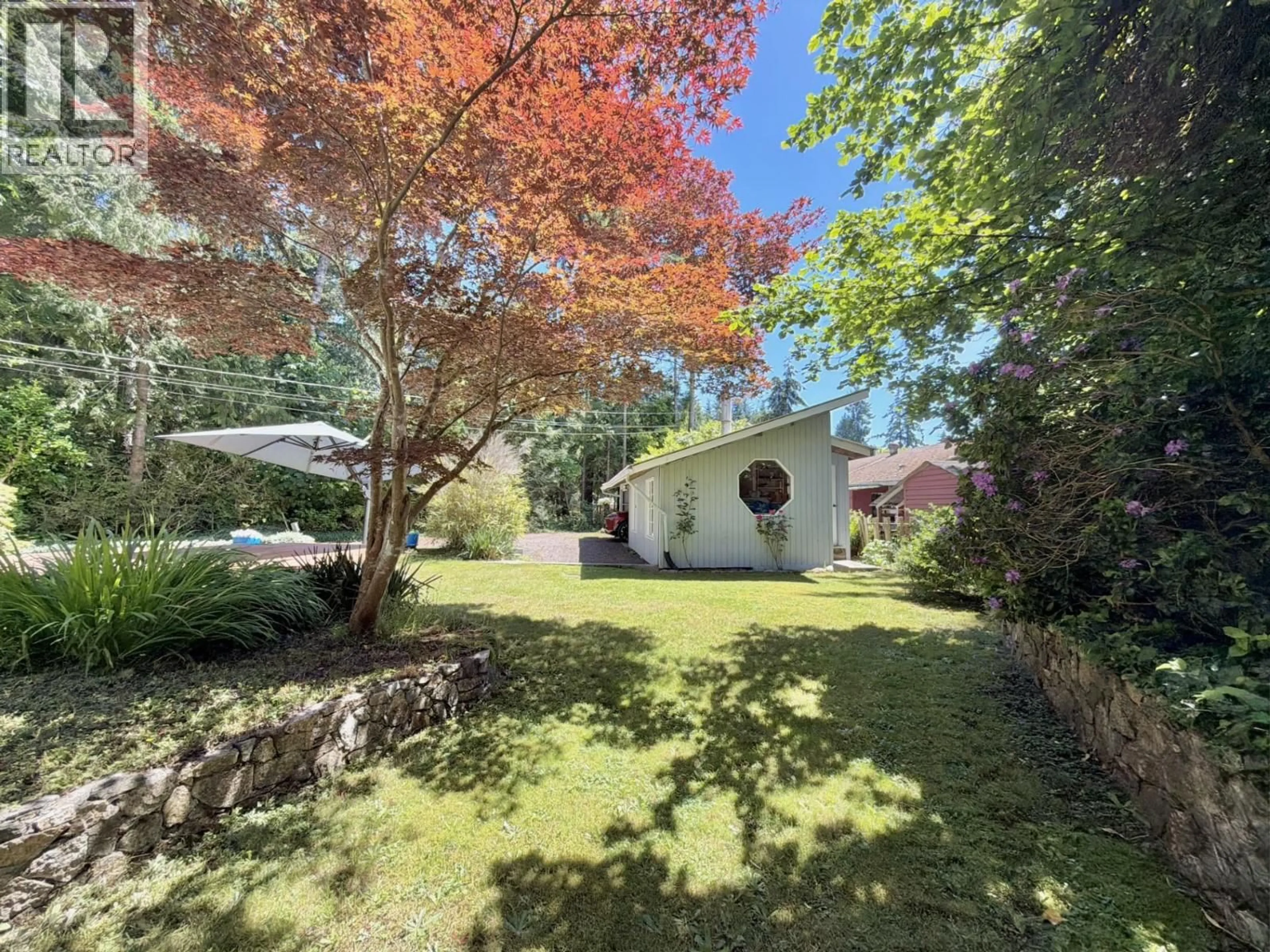 A pic from outside/outdoor area/front of a property/back of a property/a pic from drone, forest/trees view for 3658 BEACH AVENUE, Roberts Creek British Columbia V0N2W2