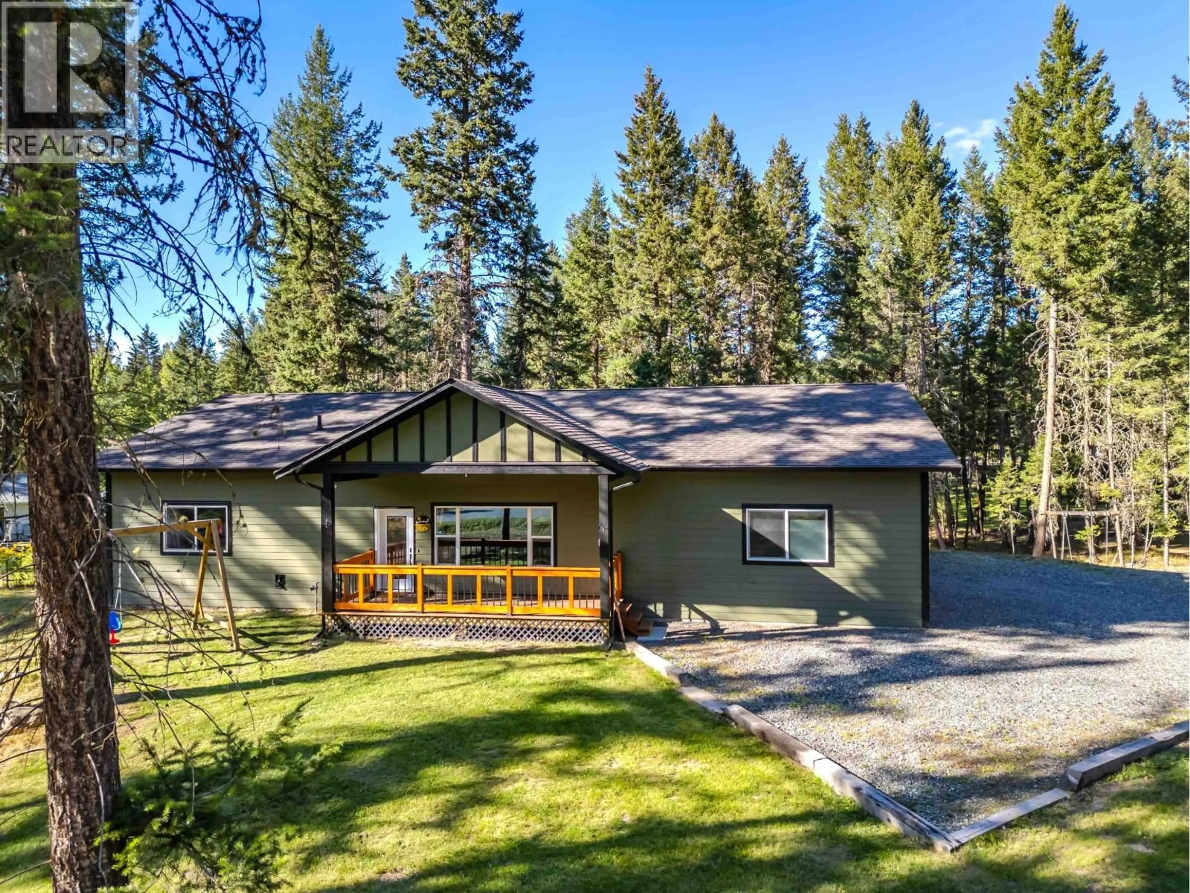 Home with vinyl exterior material, forest/trees view for 5065 KINNCUM ROAD, 108 Mile Ranch British Columbia V0K2Z0