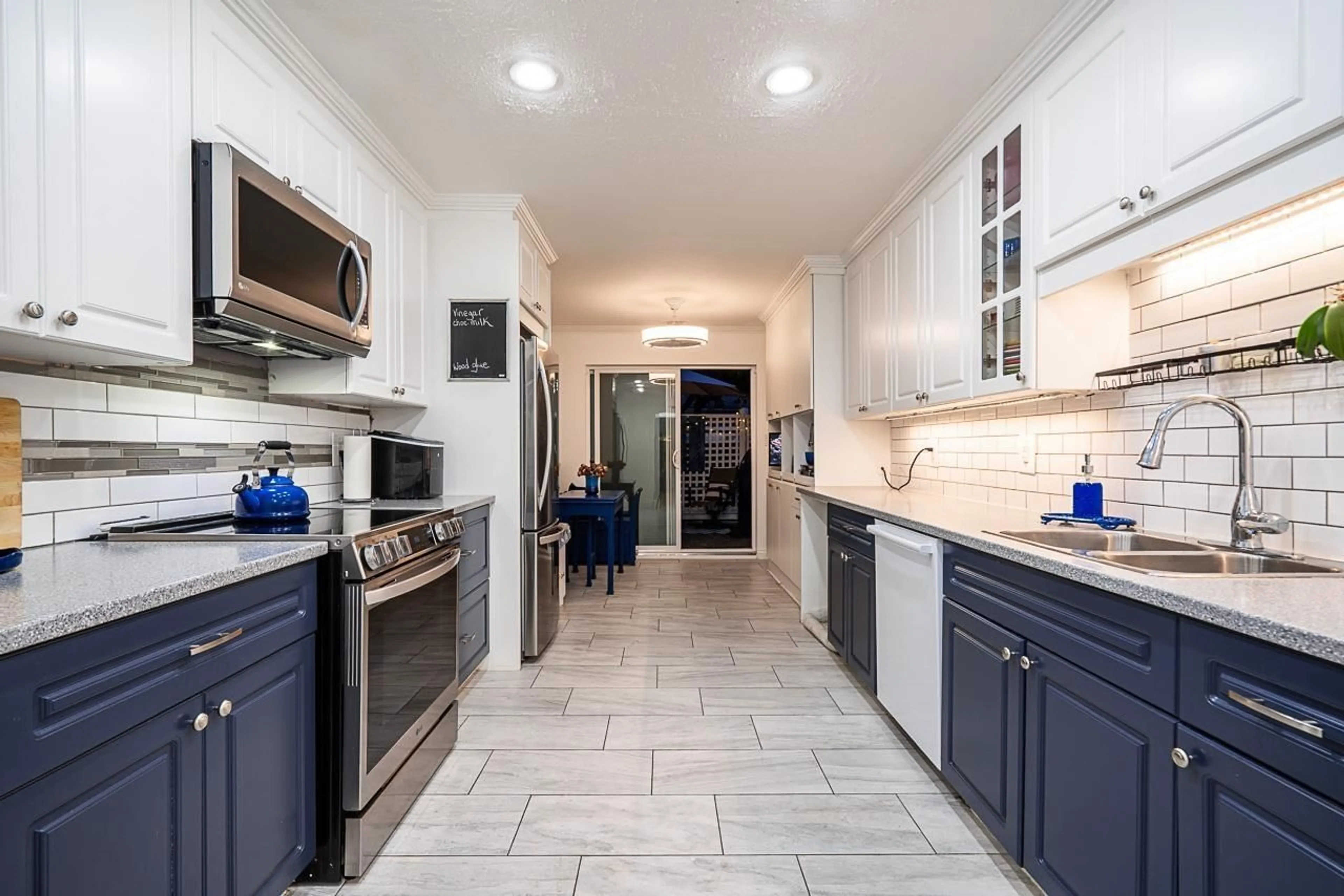 Open concept kitchen, ceramic/tile floor for 134 - 5641 201 STREET, Langley British Columbia V3A8A4