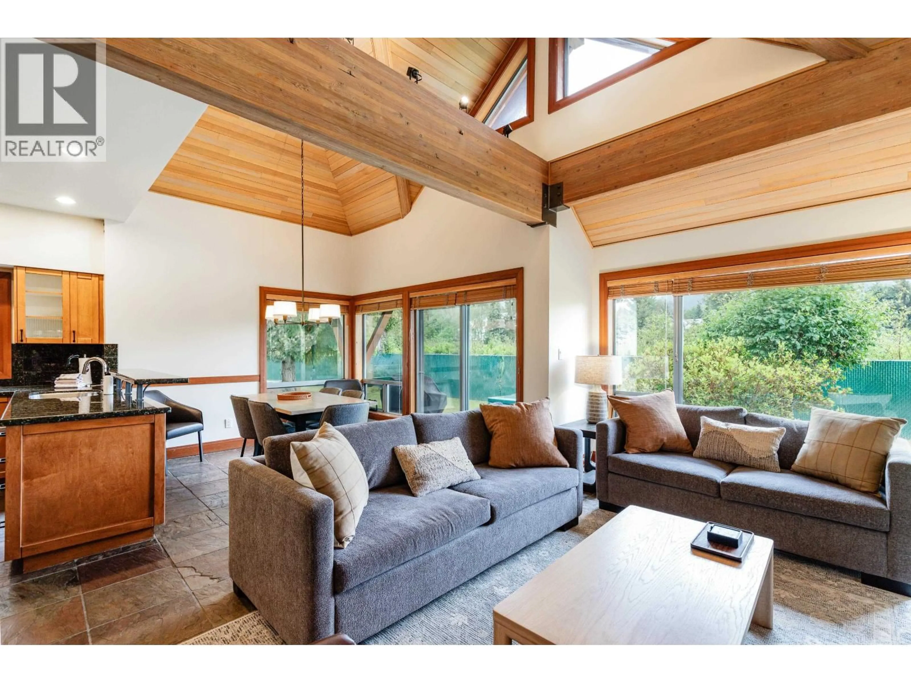 Living room with furniture, wood/laminate floor for 4728 A SETTEBELLO DRIVE, Whistler British Columbia V8E0Z4