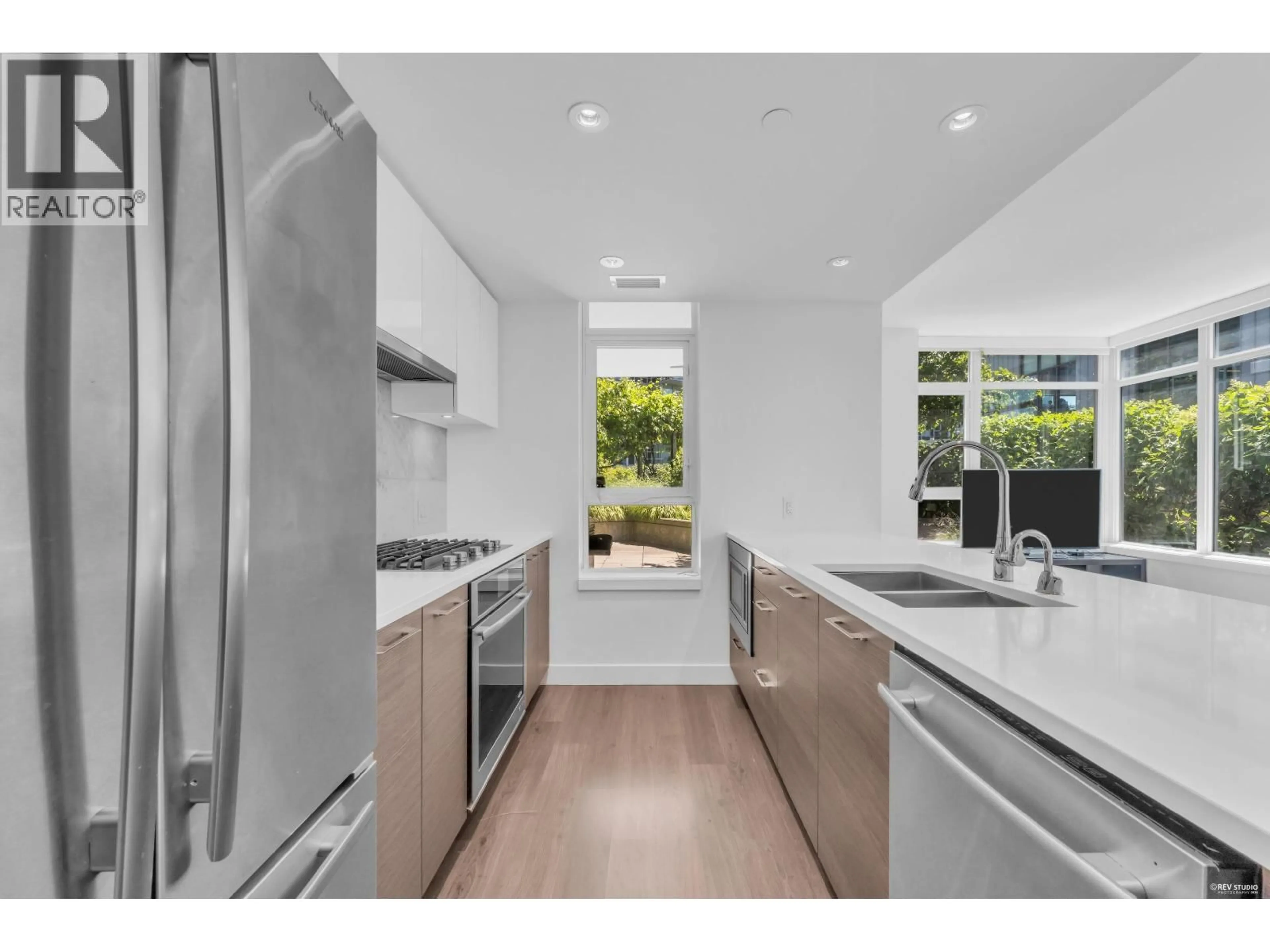 Open concept kitchen, unknown for 203 - 8538 RIVER DISTRICT CROSSING, Vancouver British Columbia V5S0C9