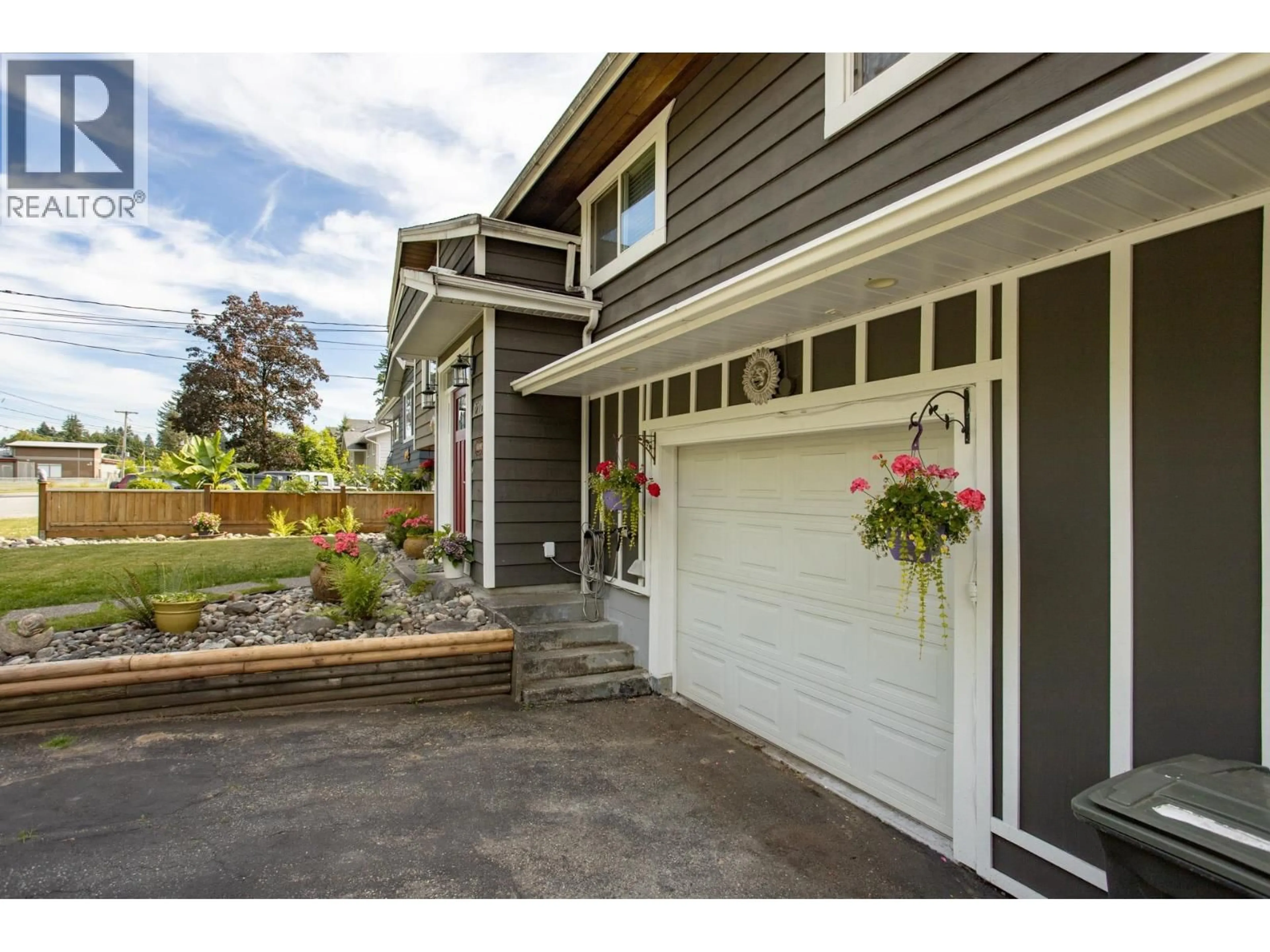 Home with vinyl exterior material, street for 12115 BLAKELY ROAD, Pitt Meadows British Columbia V3Y1J3