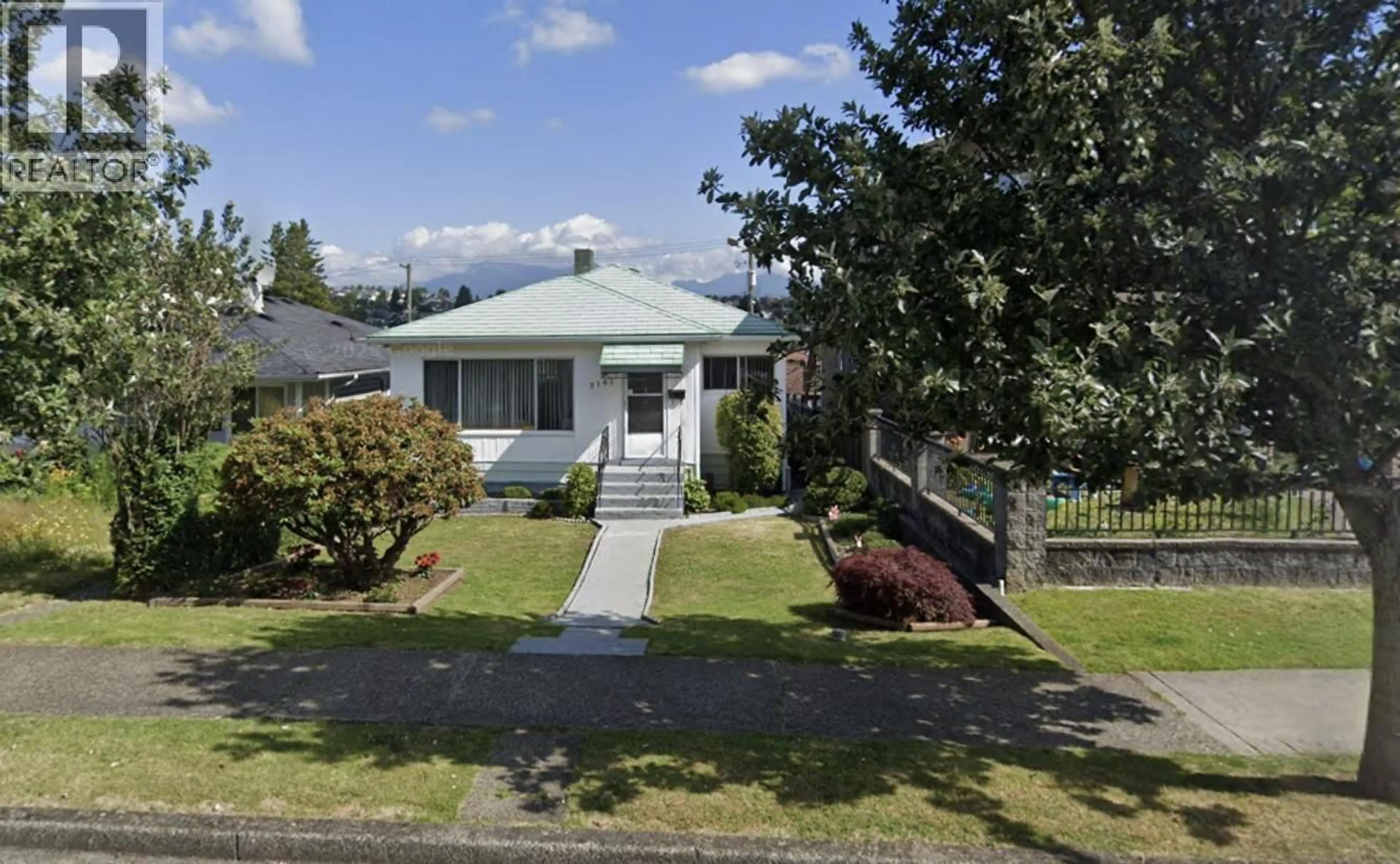 A pic from outside/outdoor area/front of a property/back of a property/a pic from drone, street for 3167 14TH AVENUE, Vancouver British Columbia V3M2J3