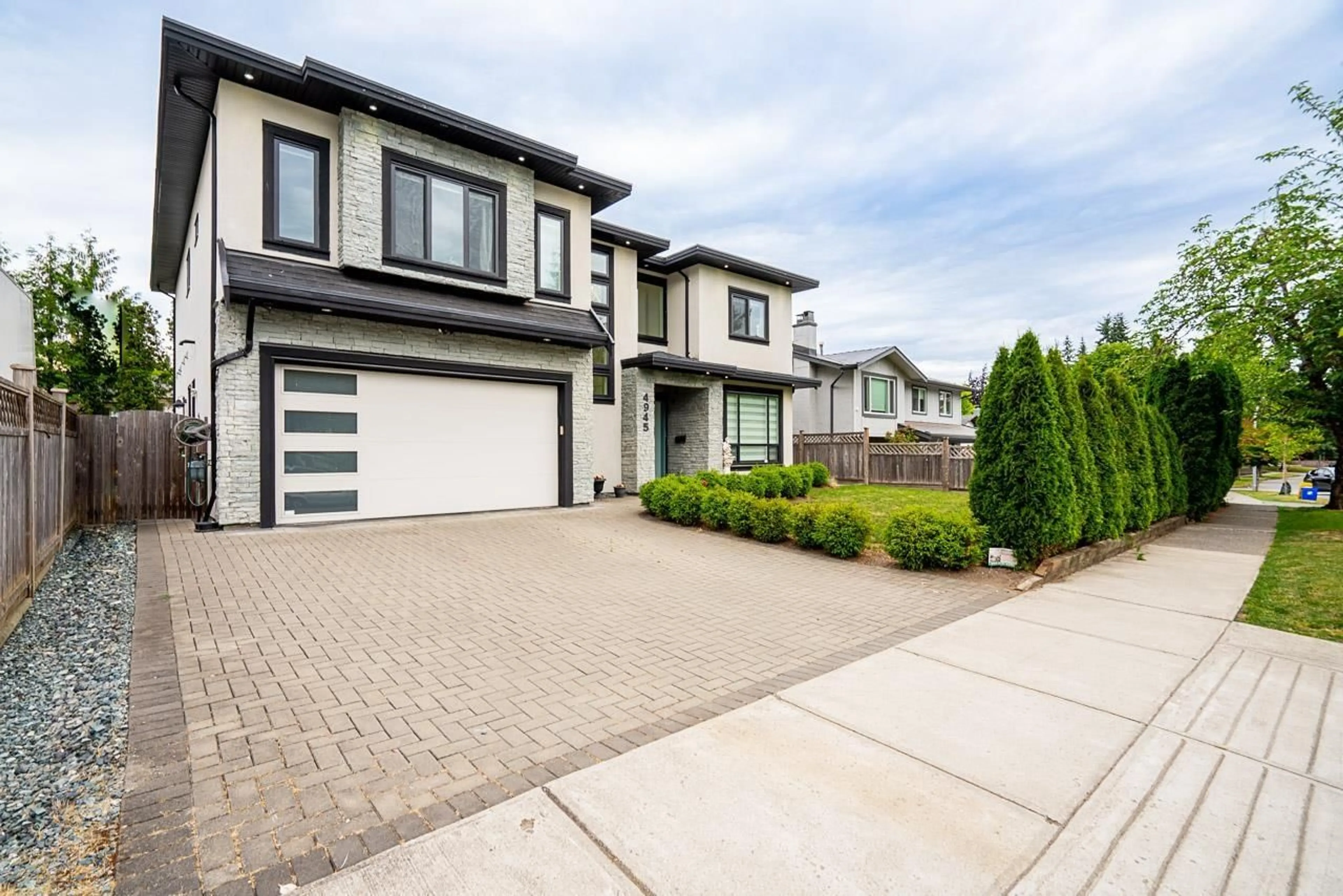 Home with brick exterior material, street for 4945 205A STREET, Langley British Columbia V3A2A8