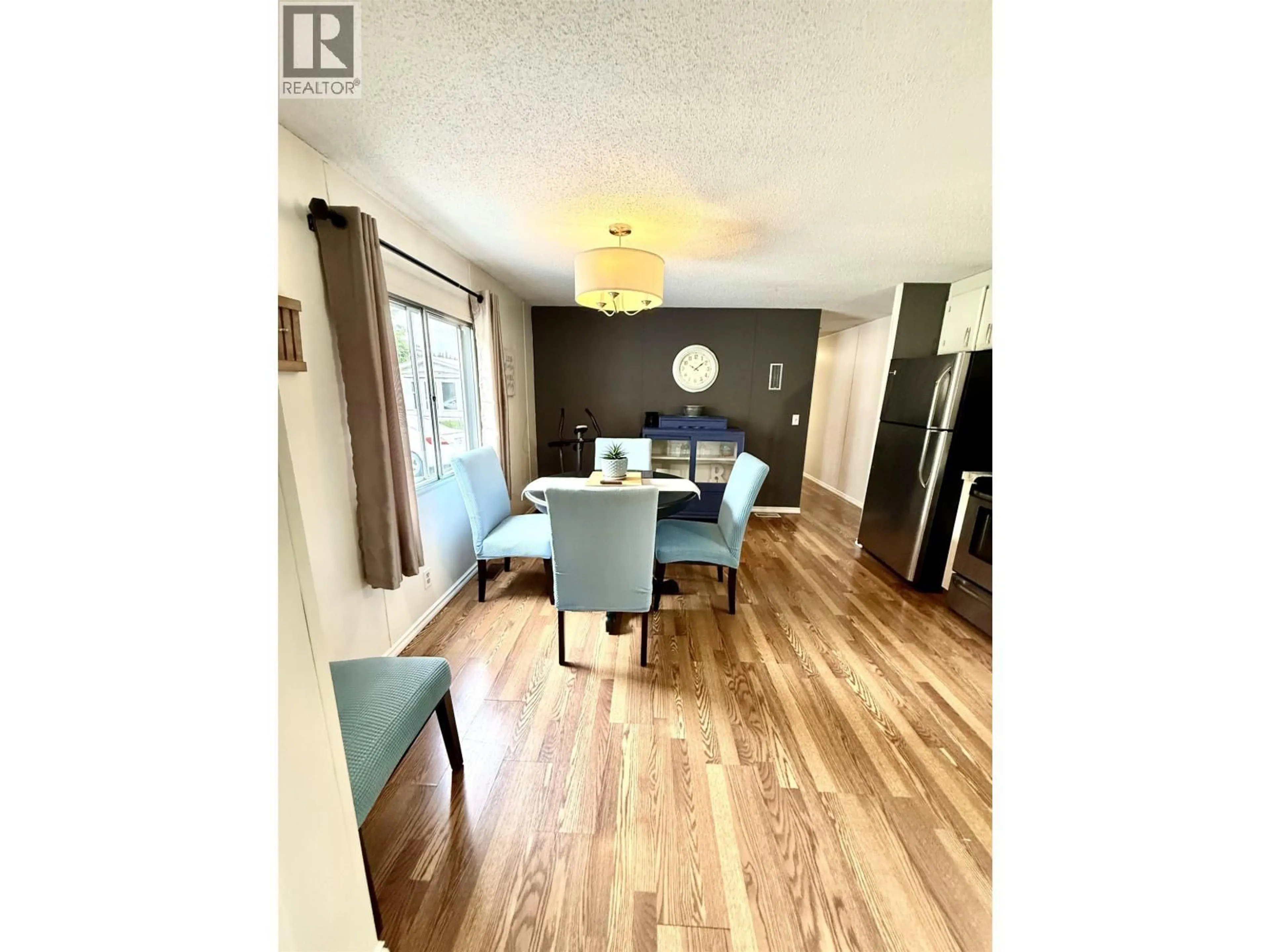 Dining room, wood/laminate floor for 2136 EVASKO ROAD, Prince George British Columbia V2N6T7