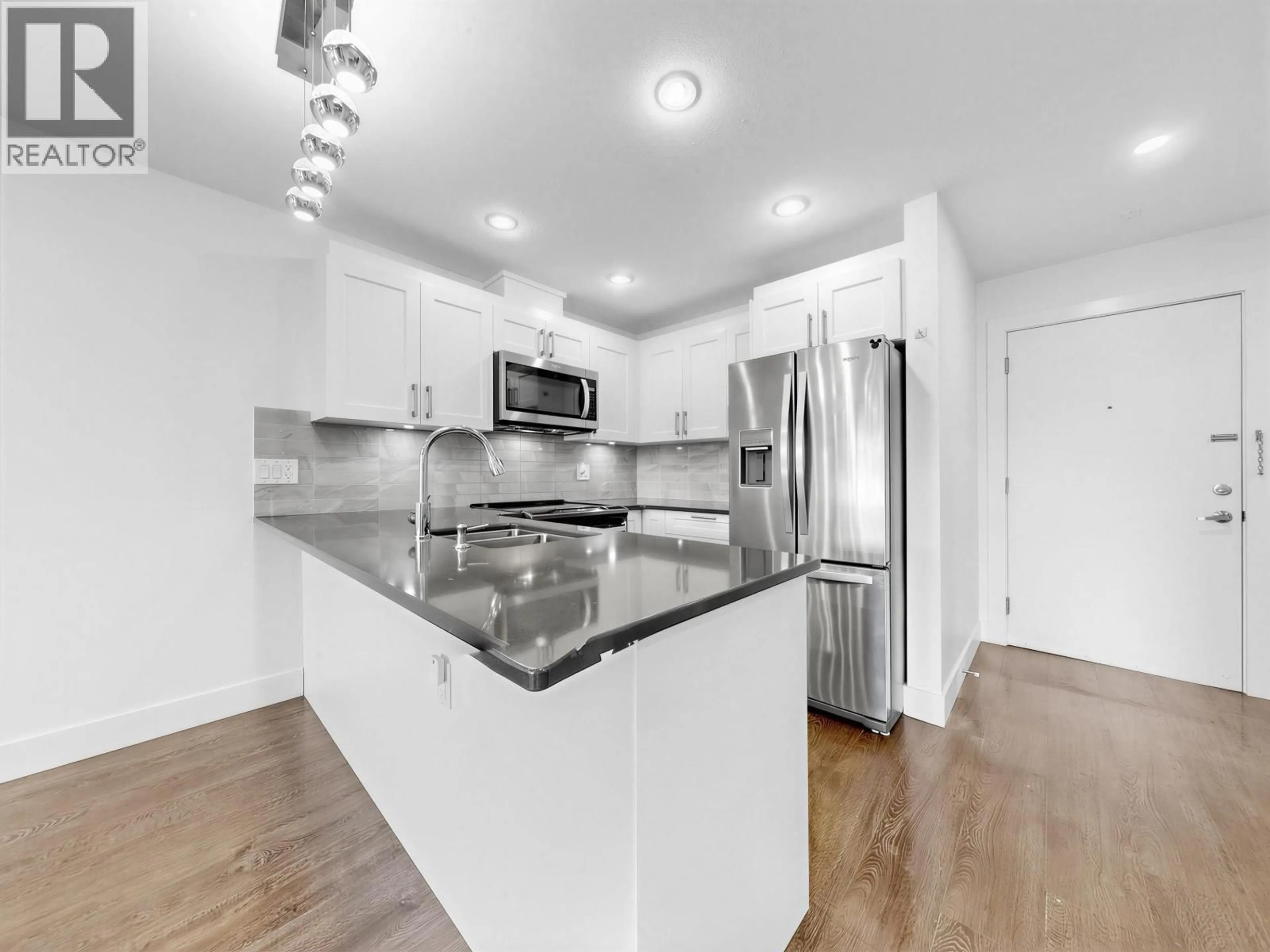 Open concept kitchen, unknown for 401 - 1990 WESTMINSTER AVENUE, Port Coquitlam British Columbia V3B1E8