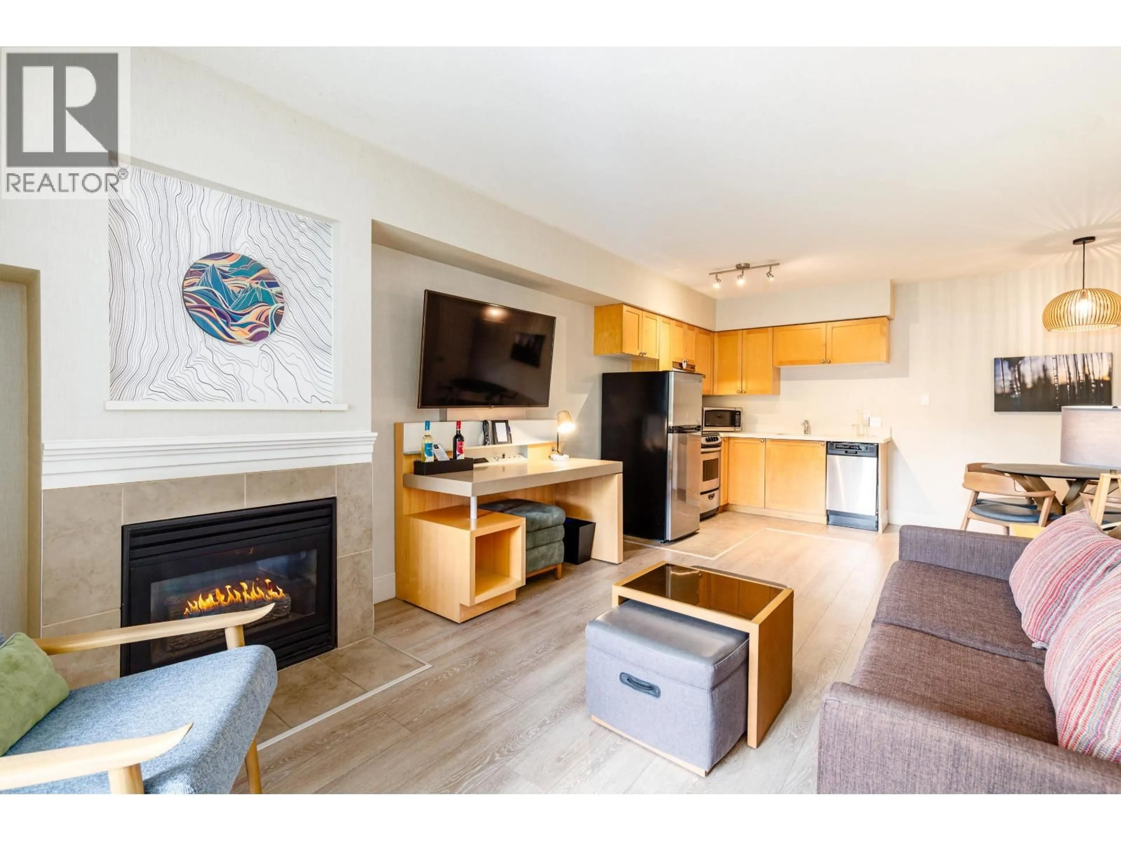 Open concept kitchen, wood/laminate floor for 2318/20 - 4308 MAIN STREET, Whistler British Columbia V8E1A9