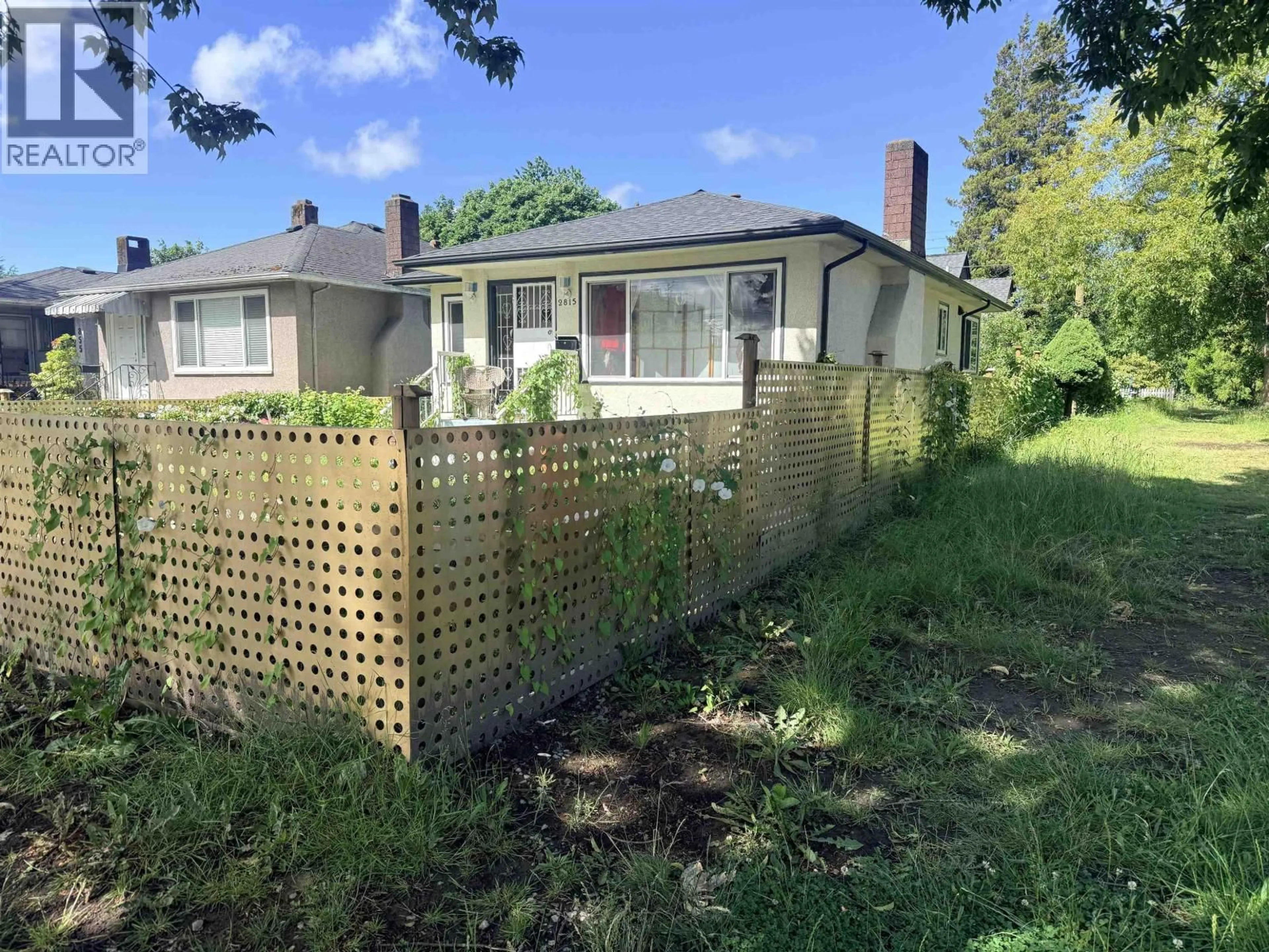 A pic from outside/outdoor area/front of a property/back of a property/a pic from drone, street for 2815 NANAIMO STREET, Vancouver British Columbia V5N5G2