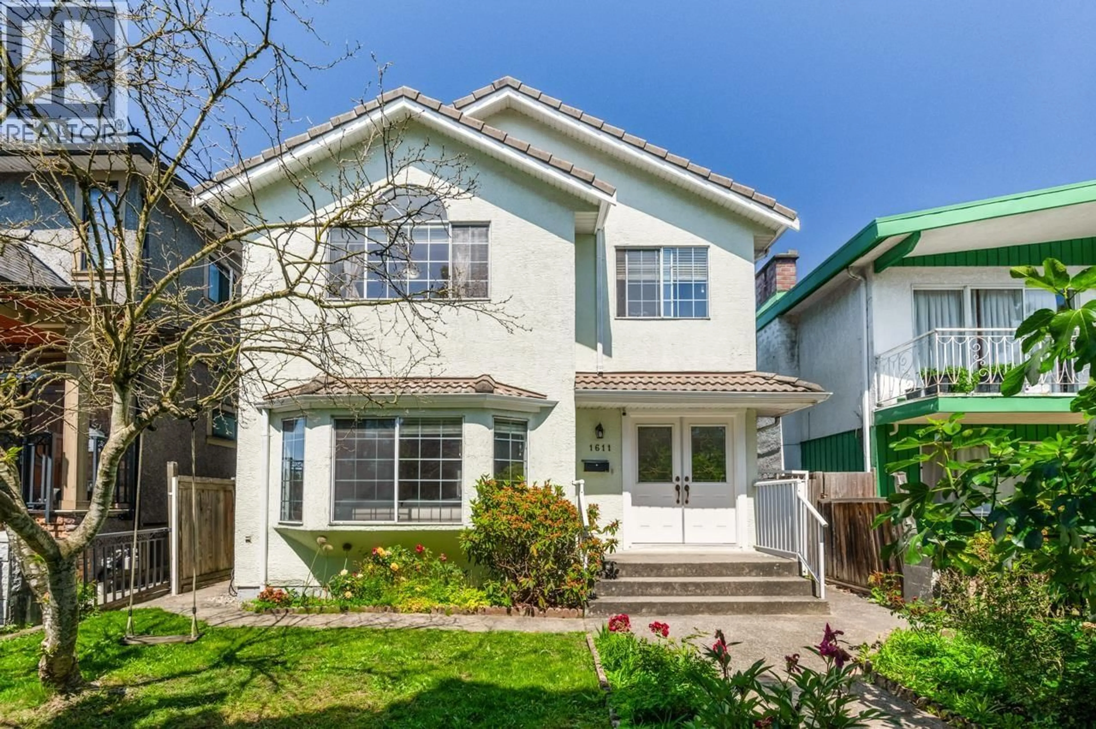 Home with vinyl exterior material, street for 1611 57TH AVENUE, Vancouver British Columbia V5P2B3