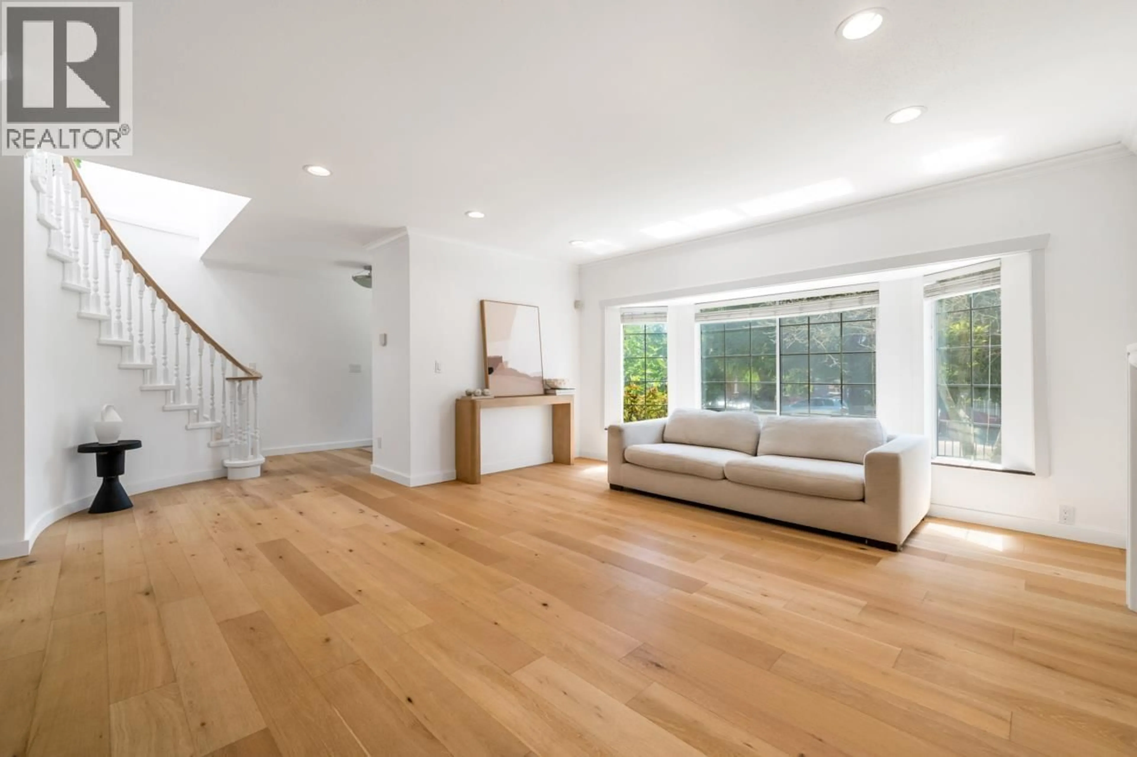 Living room with furniture, wood/laminate floor for 1611 57TH AVENUE, Vancouver British Columbia V5P2B3