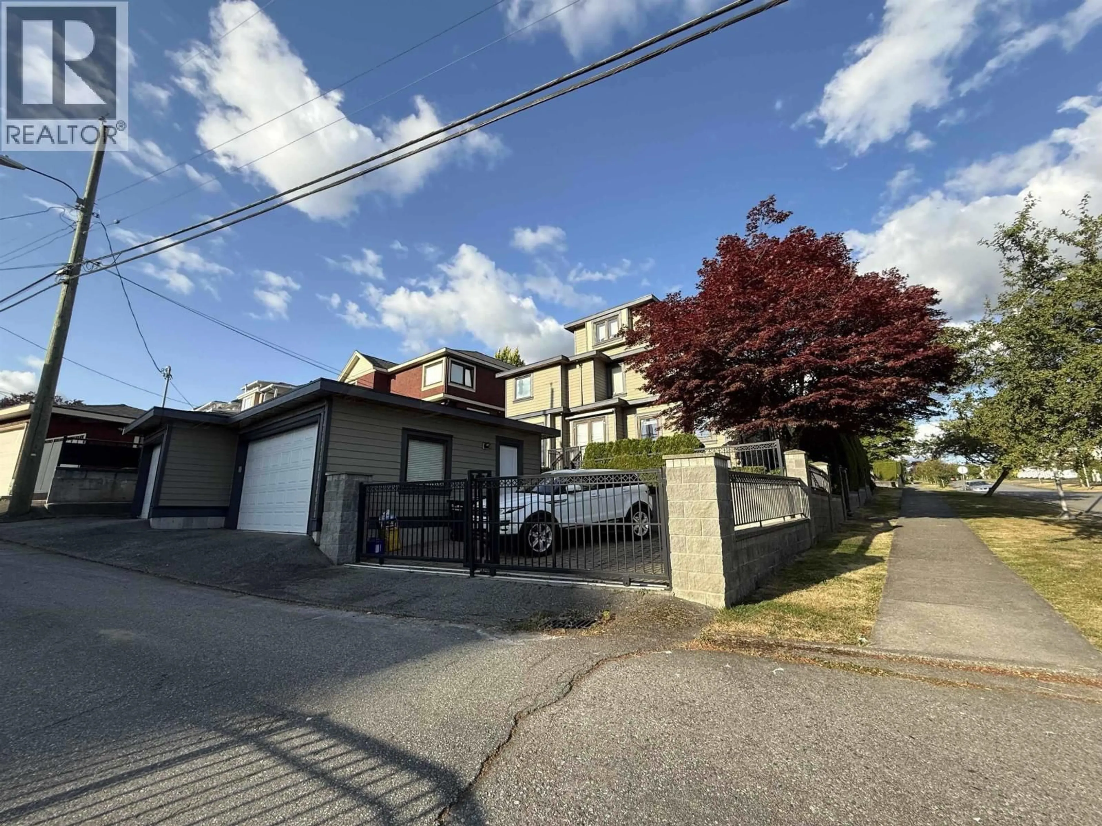 A pic from outside/outdoor area/front of a property/back of a property/a pic from drone, street for 7689 JASPER CRESCENT, Vancouver British Columbia V5P3S7