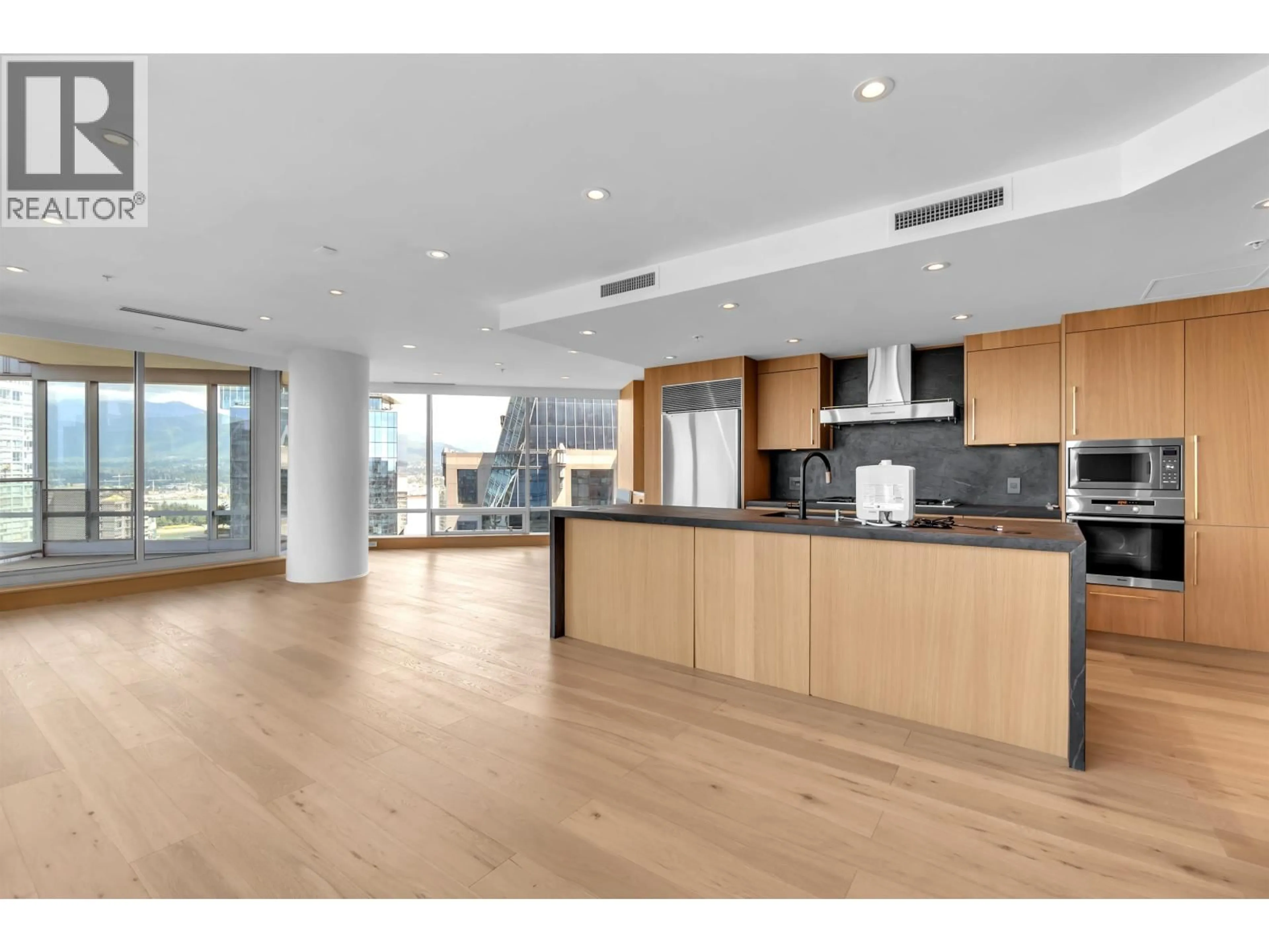 Open concept kitchen, wood/laminate floor for 3202 - 1111 ALBERNI STREET, Vancouver British Columbia V6E4V2