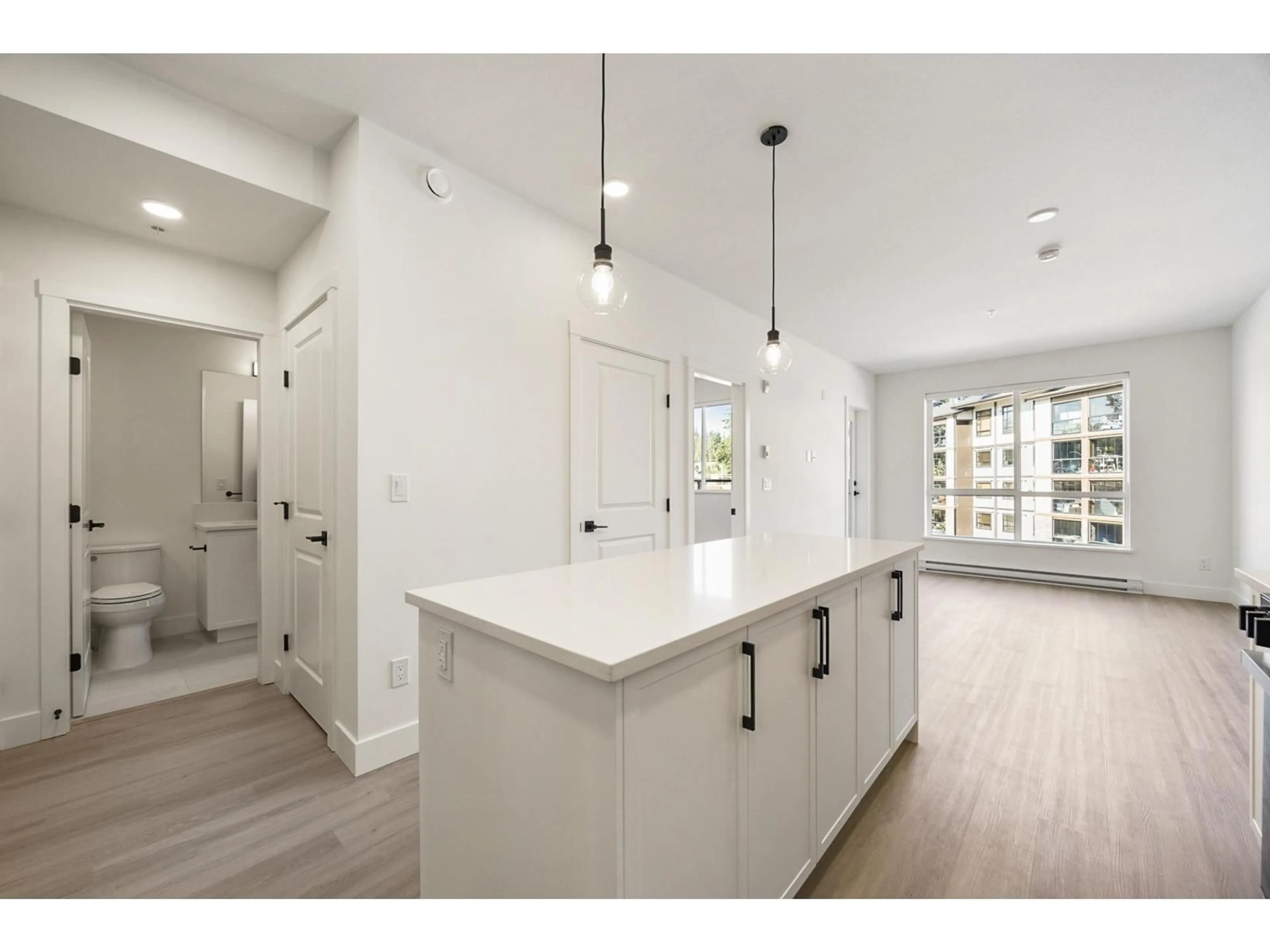 Open concept kitchen, unknown for 301 - 3528 146A STREET, Surrey British Columbia V4P0H4