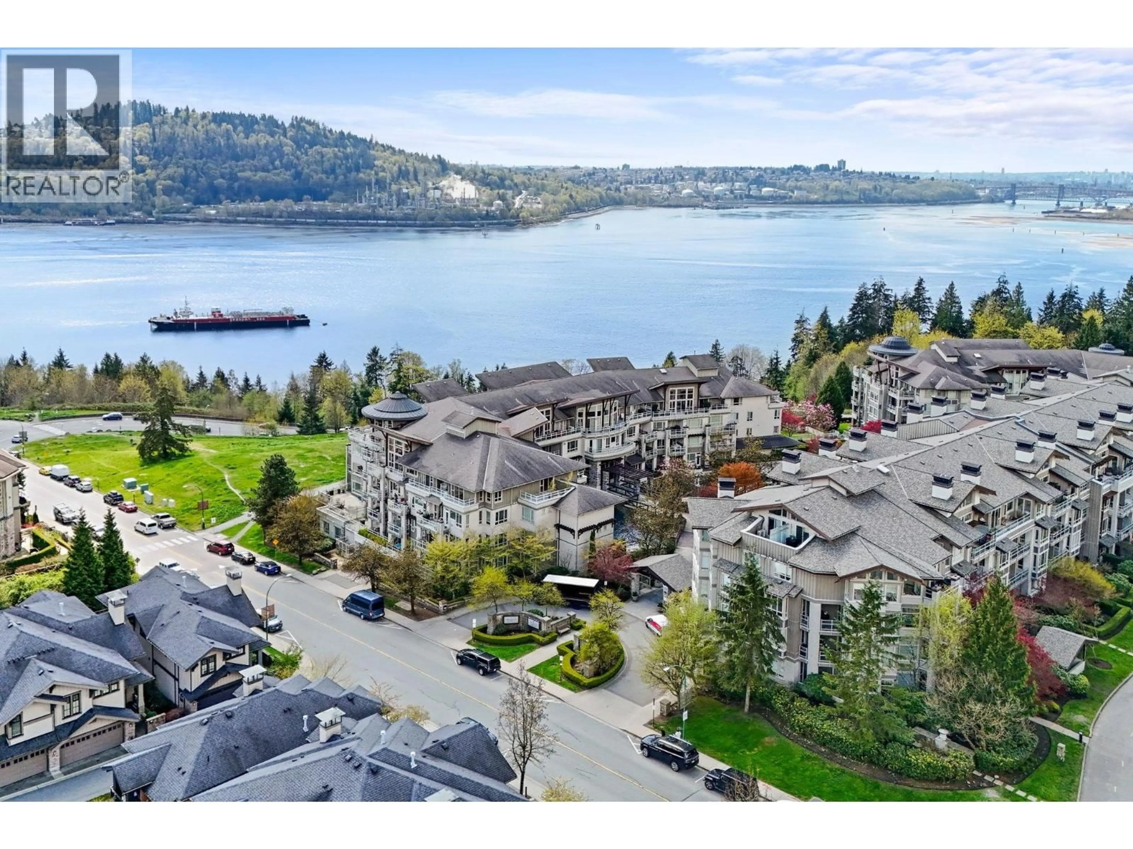 A pic from outside/outdoor area/front of a property/back of a property/a pic from drone, water/lake/river/ocean view for 307 - 530 RAVEN WOODS DRIVE, North Vancouver British Columbia V7G2T5