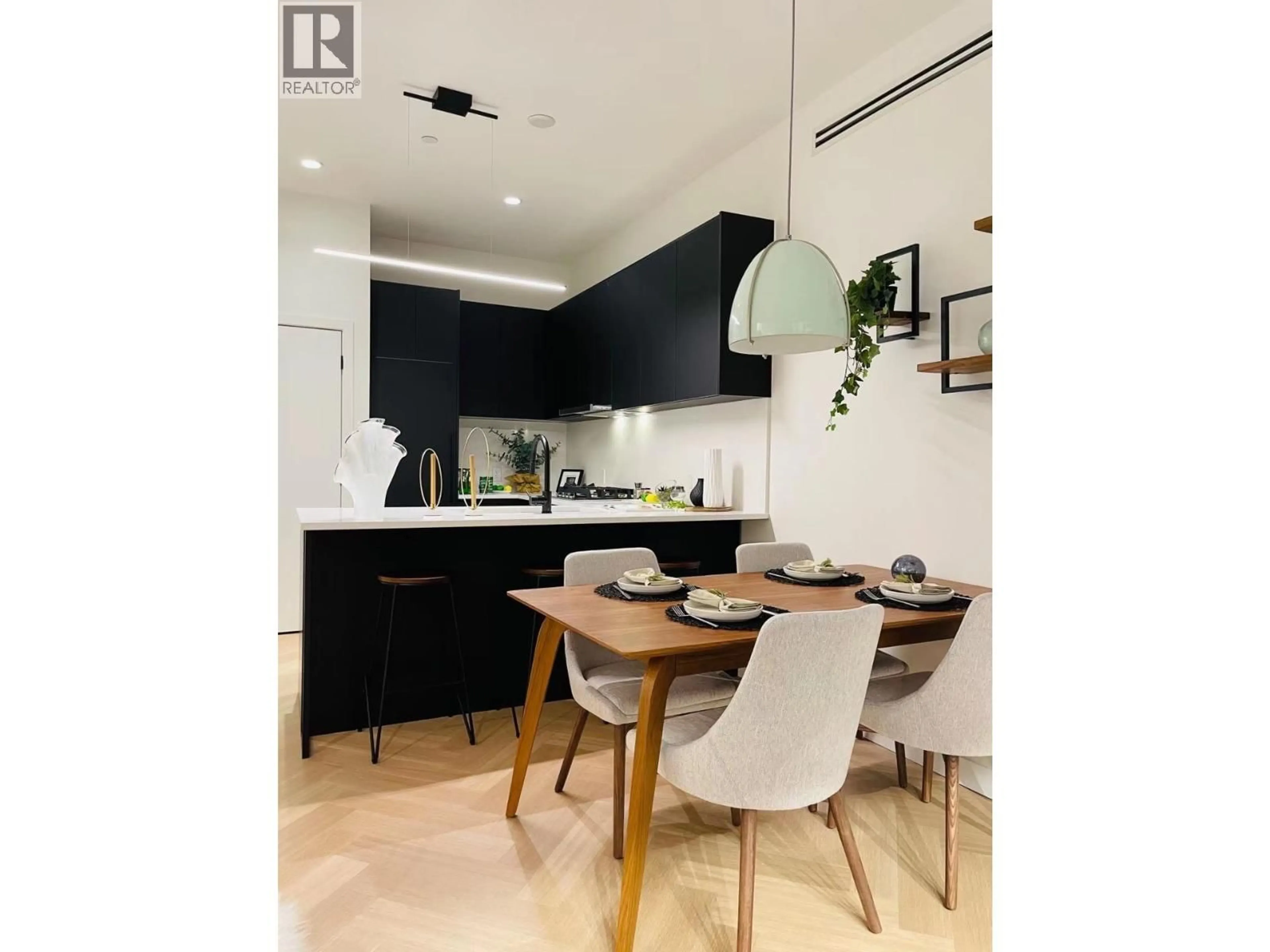 Open concept kitchen, wood/laminate floor for 509 - 599 DANSEY AVENUE, Coquitlam British Columbia V3J5S4