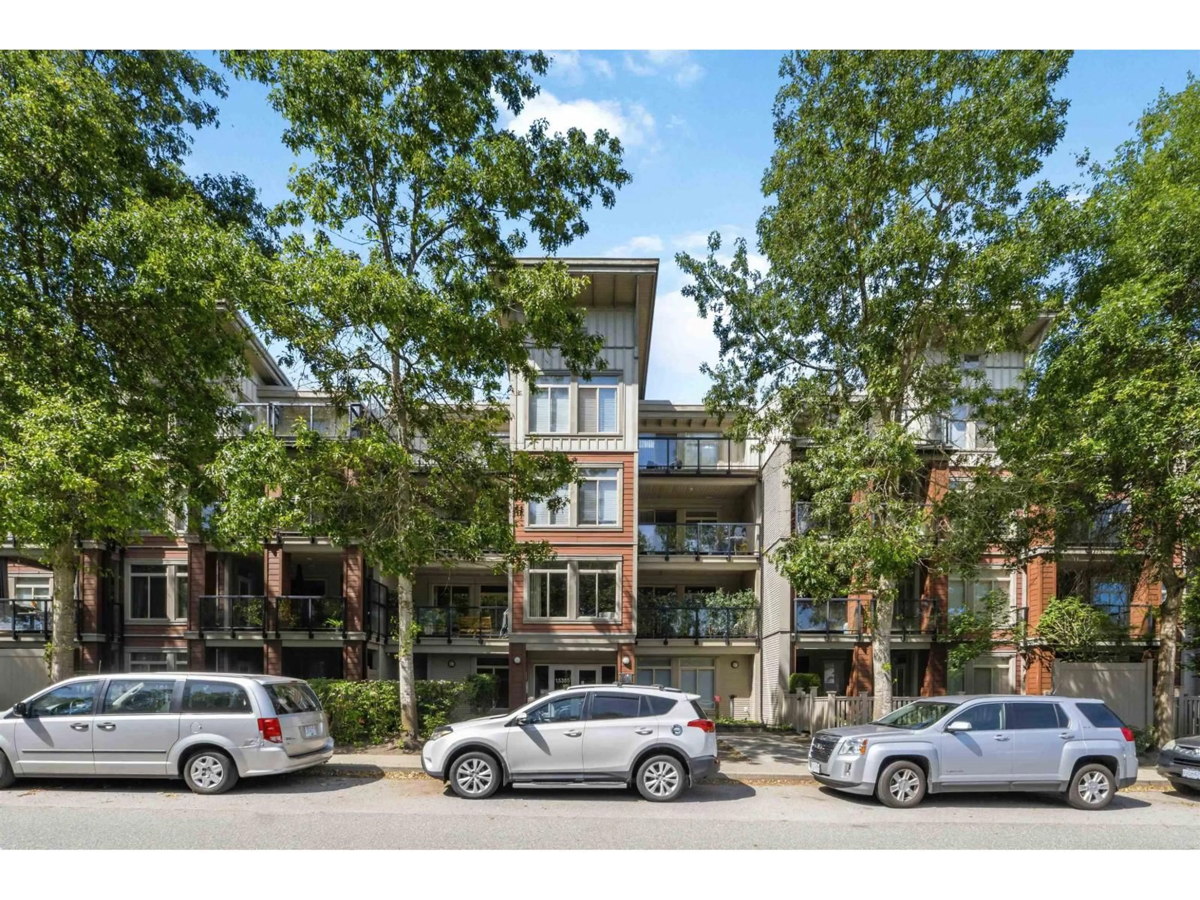 A pic from outside/outdoor area/front of a property/back of a property/a pic from drone, street for 421 - 15385 101A AVENUE, Surrey British Columbia V3R0B4