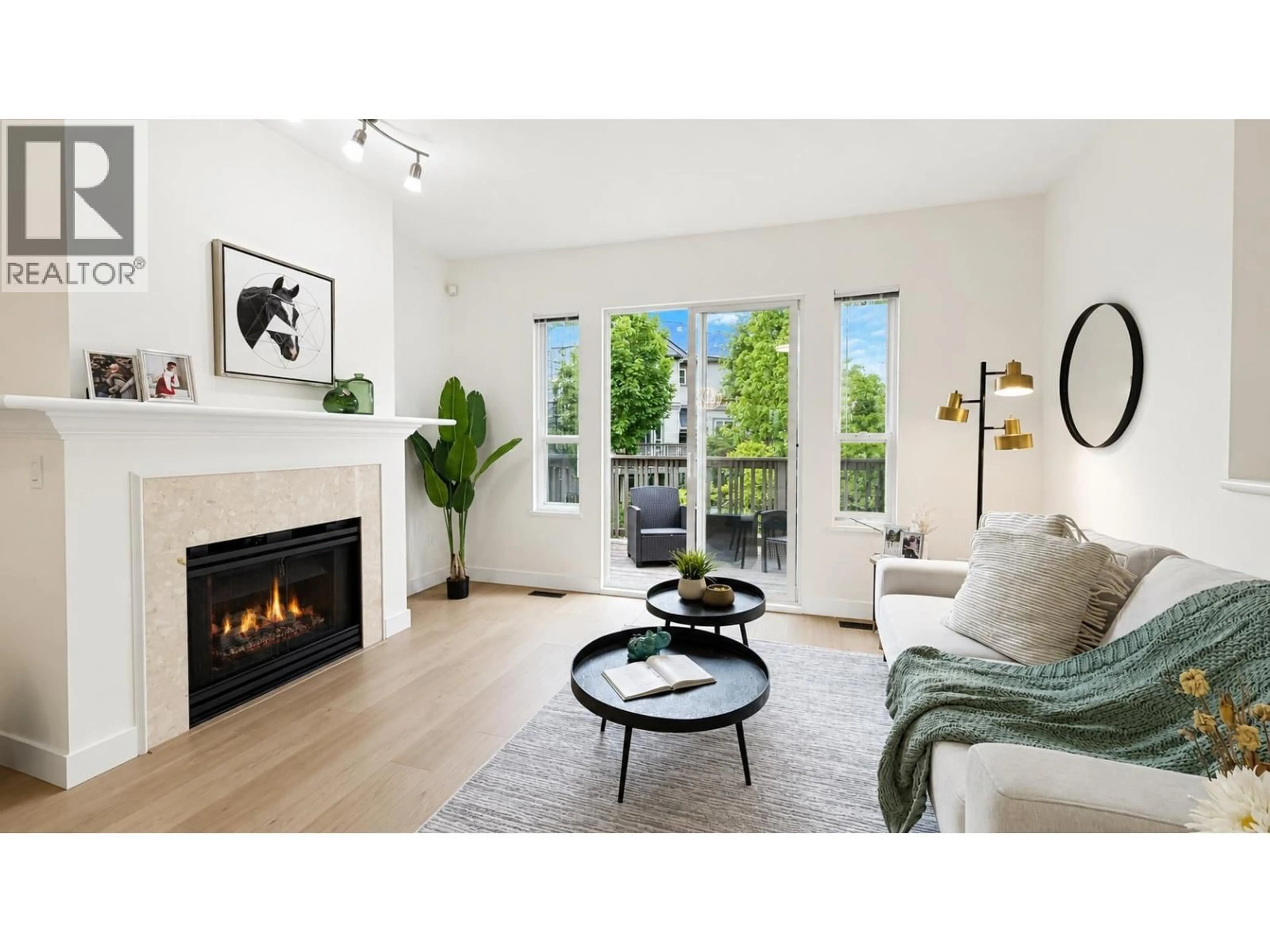 Living room with furniture, wood/laminate floor for 44 - 3880 WESTMINSTER HIGHWAY, Richmond British Columbia V7C5S1