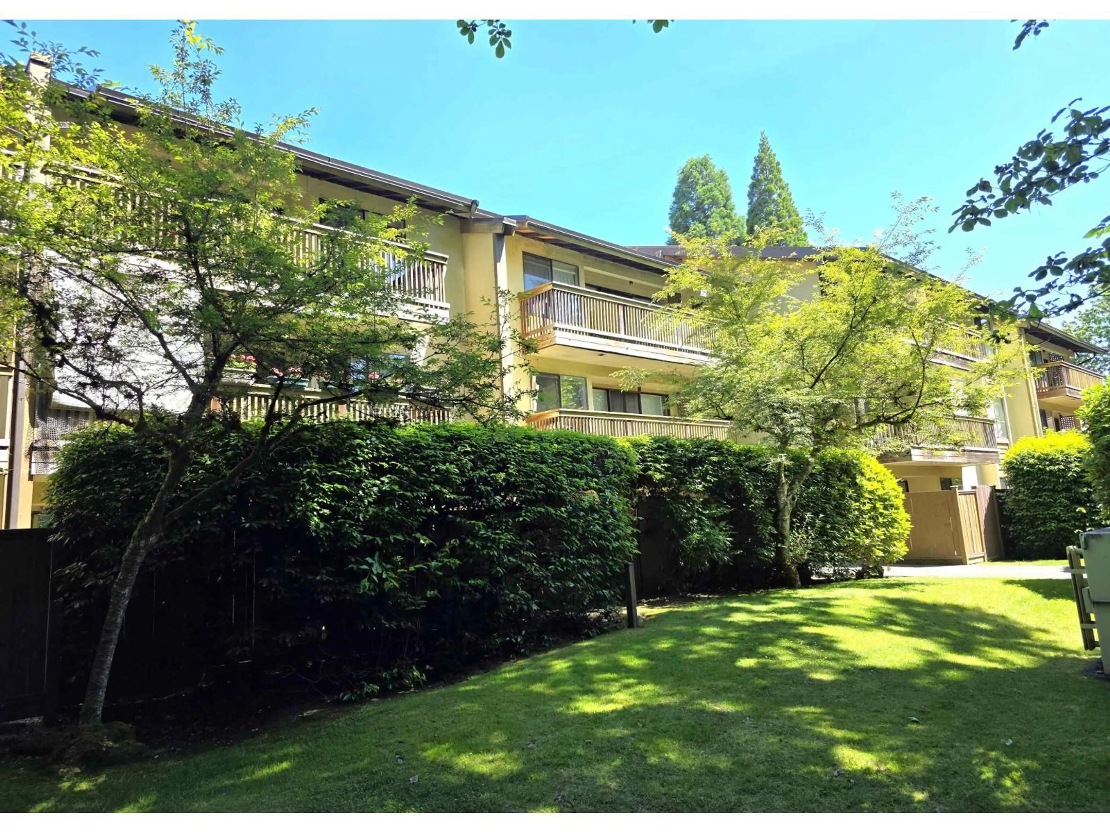 A pic from outside/outdoor area/front of a property/back of a property/a pic from drone, street for 312 - 14945 100 AVENUE, Surrey British Columbia V3R1J6