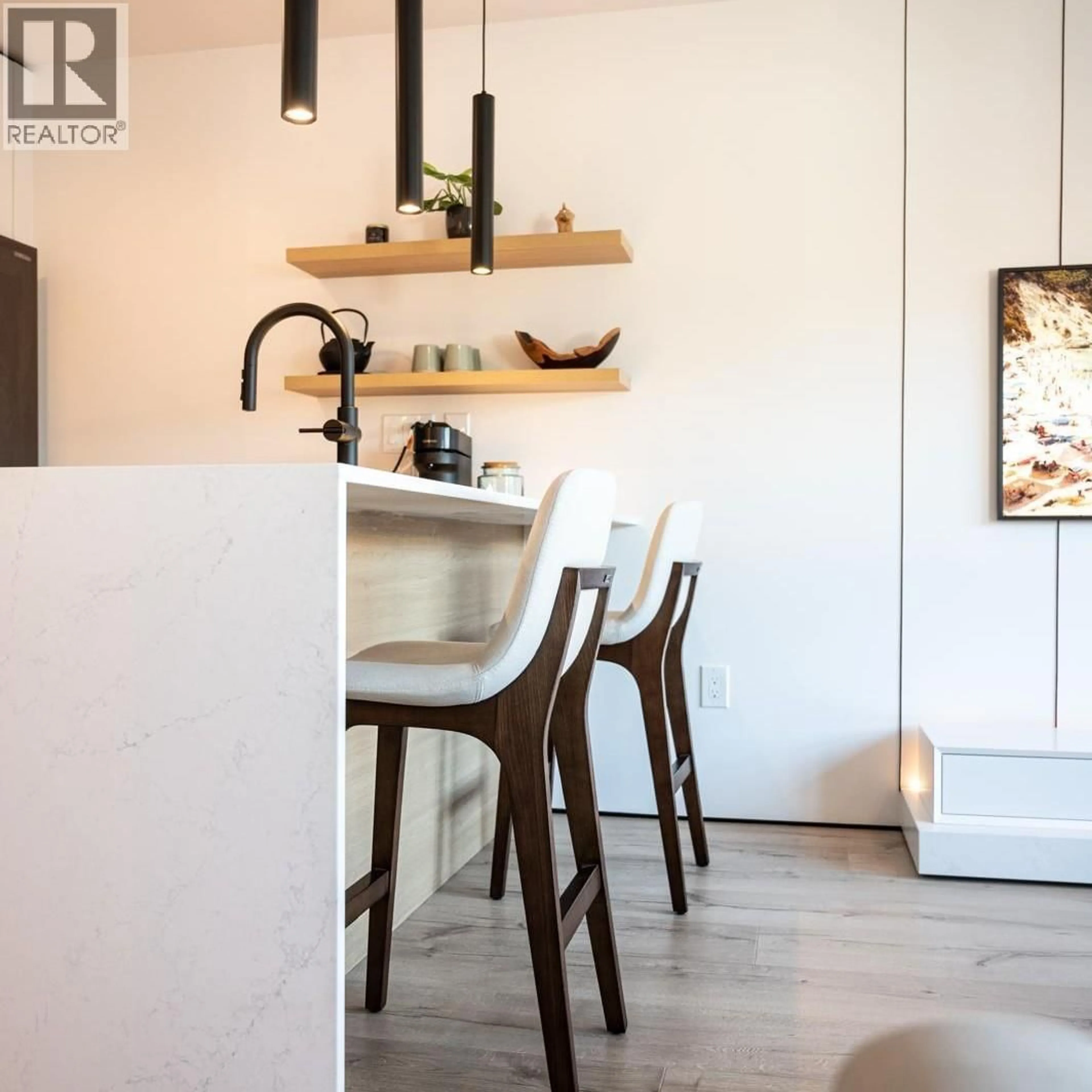 Open concept kitchen, wood/laminate floor for 502 - 2979 GLEN DRIVE, Coquitlam British Columbia V3B0B2