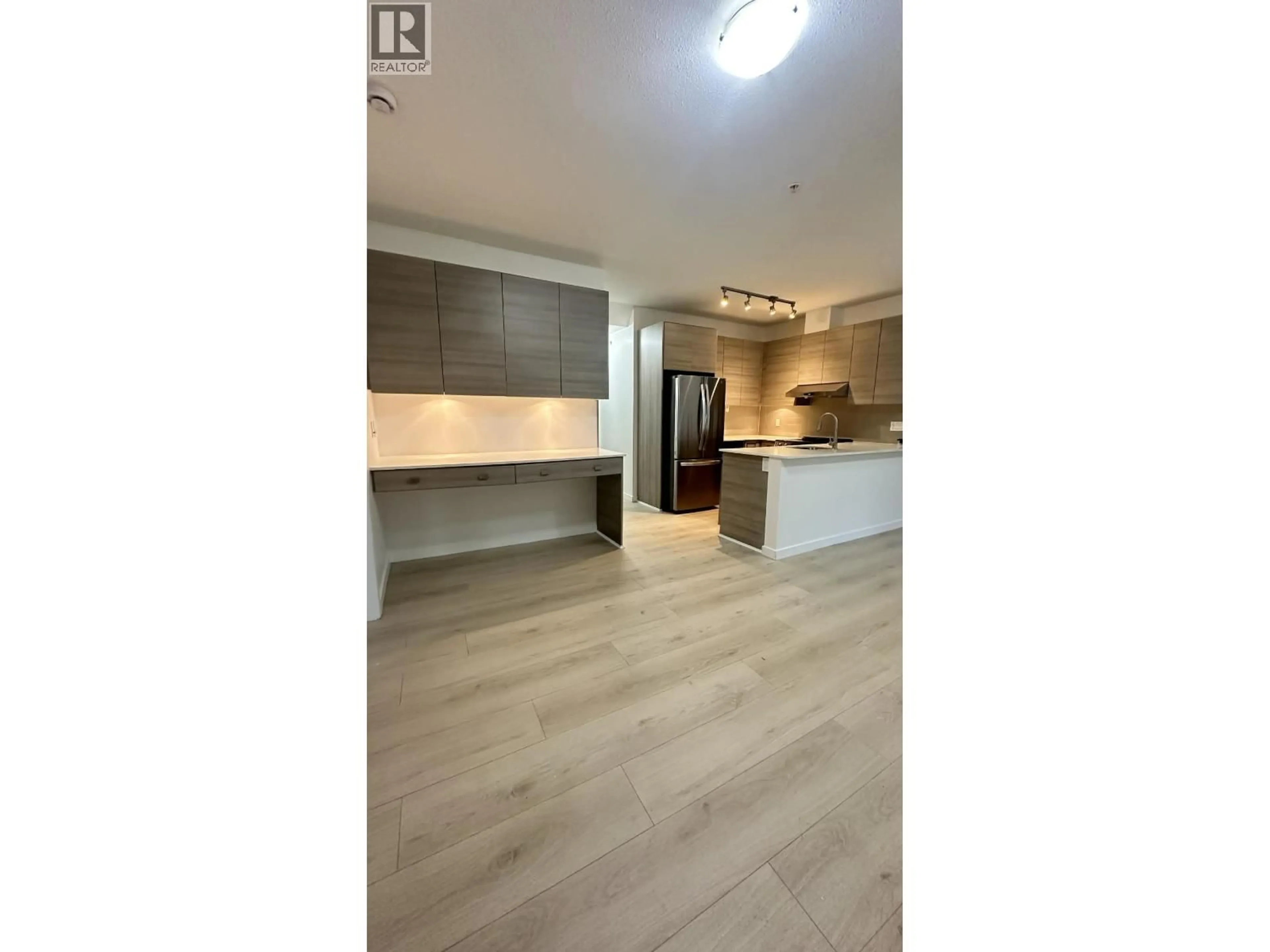 Open concept kitchen, wood/laminate floor for 32 - 6965 HASTINGS STREET, Burnaby British Columbia V5B1S9