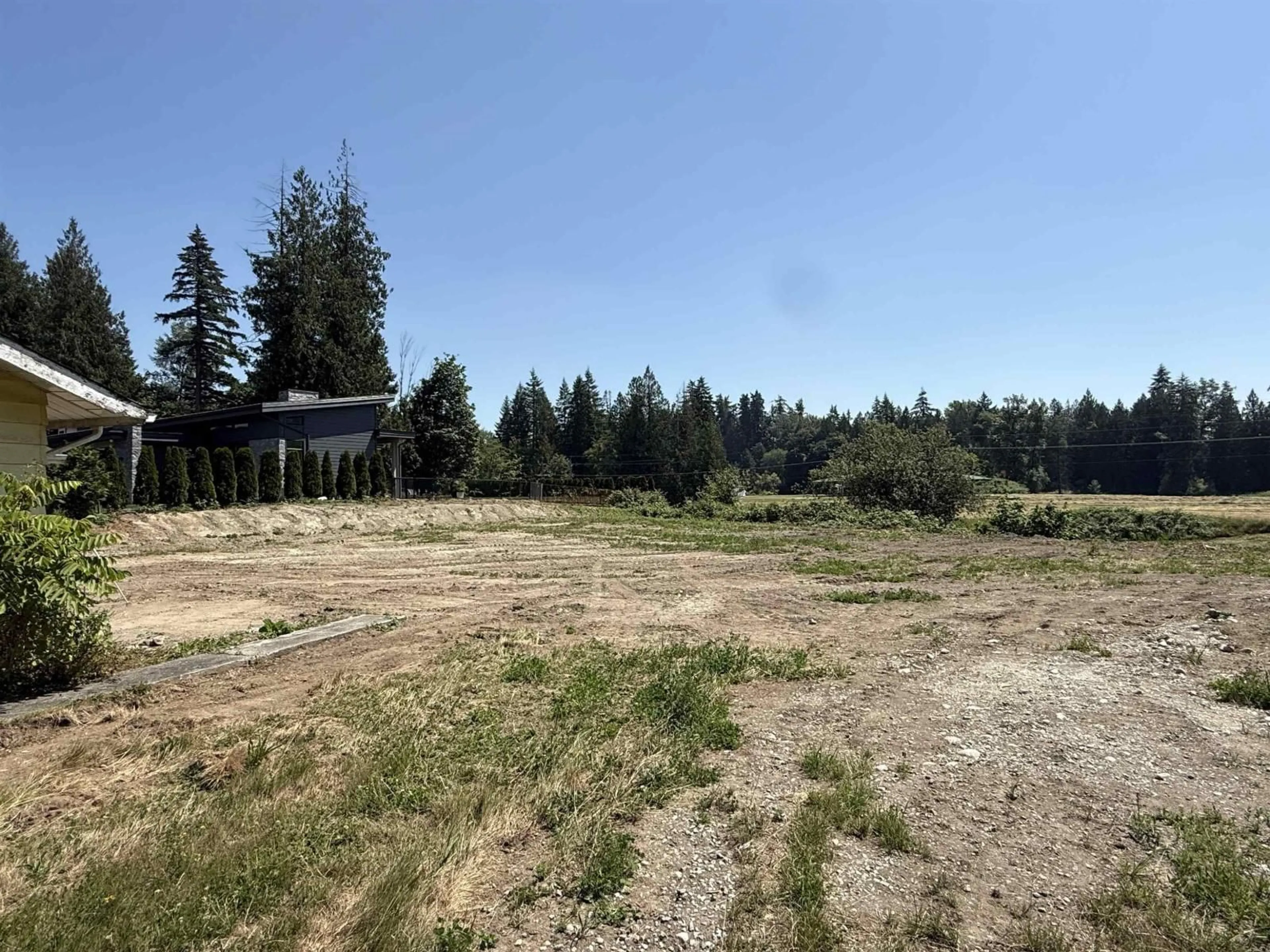 A pic from outside/outdoor area/front of a property/back of a property/a pic from drone, forest/trees view for 22134 96 AVENUE, Langley British Columbia V1M3T8