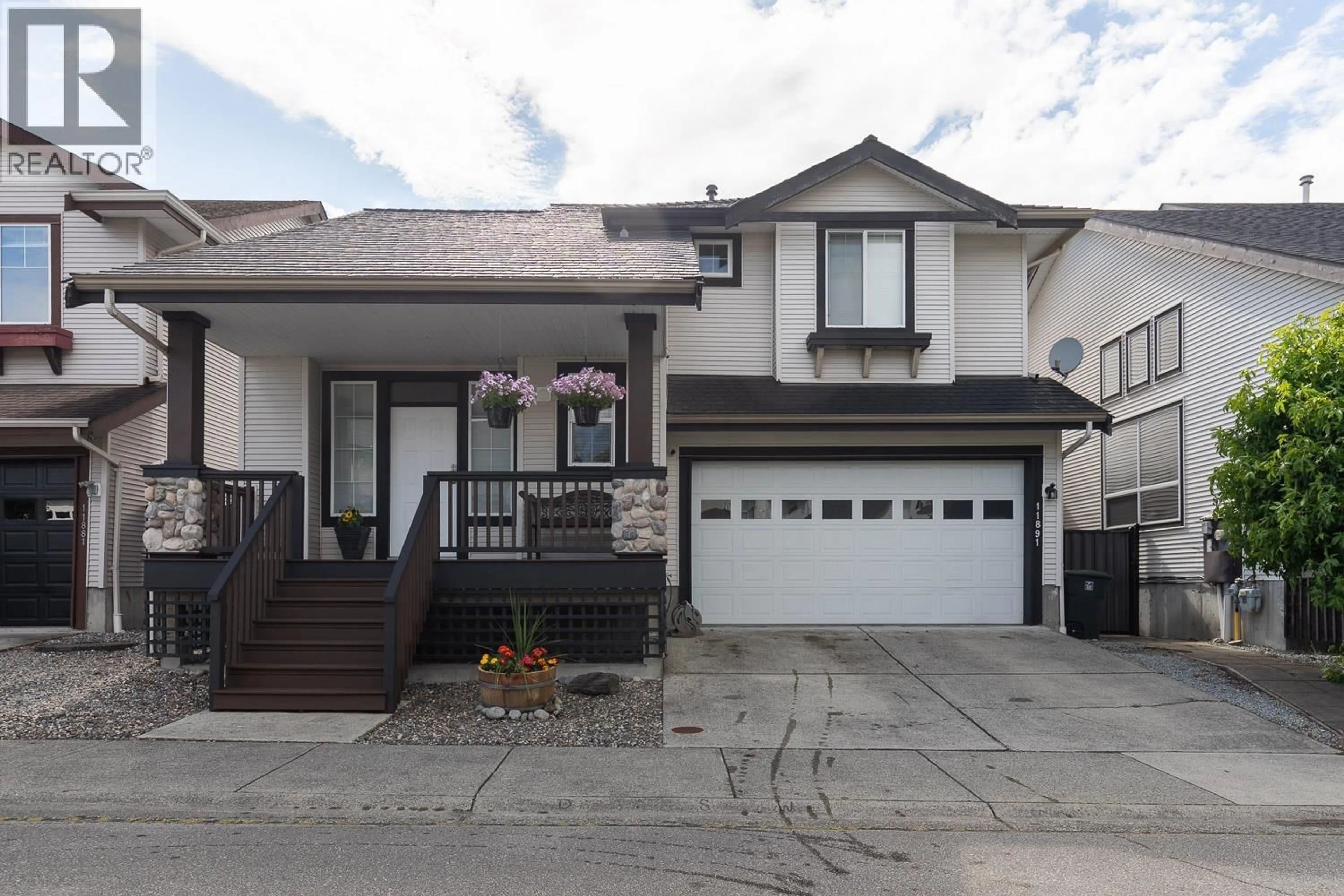 Home with vinyl exterior material, street for 11891 ORCHARD LANE, Pitt Meadows British Columbia V3Y2S6