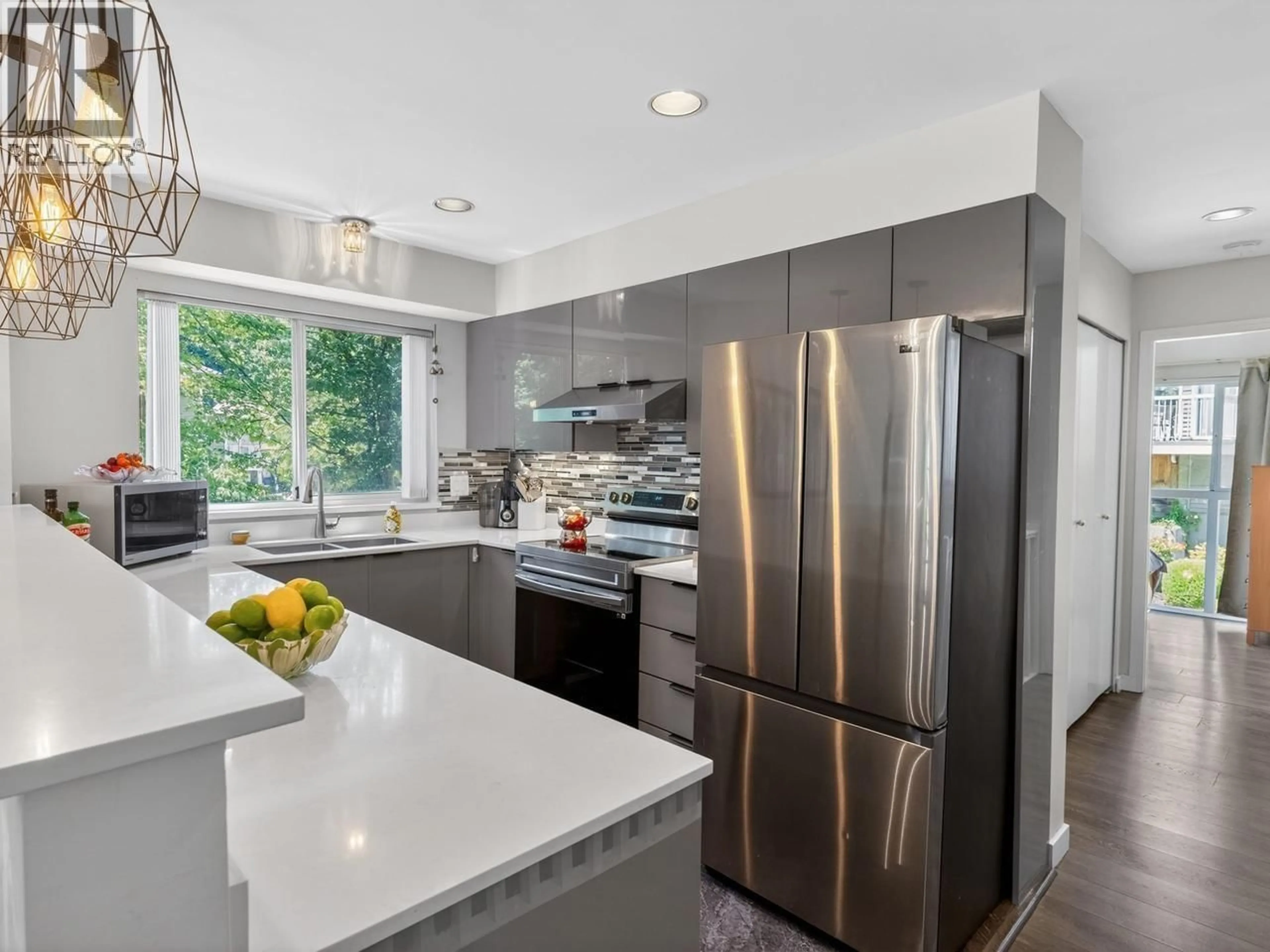 Contemporary kitchen, ceramic/tile floor for 3360 COBBLESTONE AVENUE, Vancouver British Columbia V5S4S4