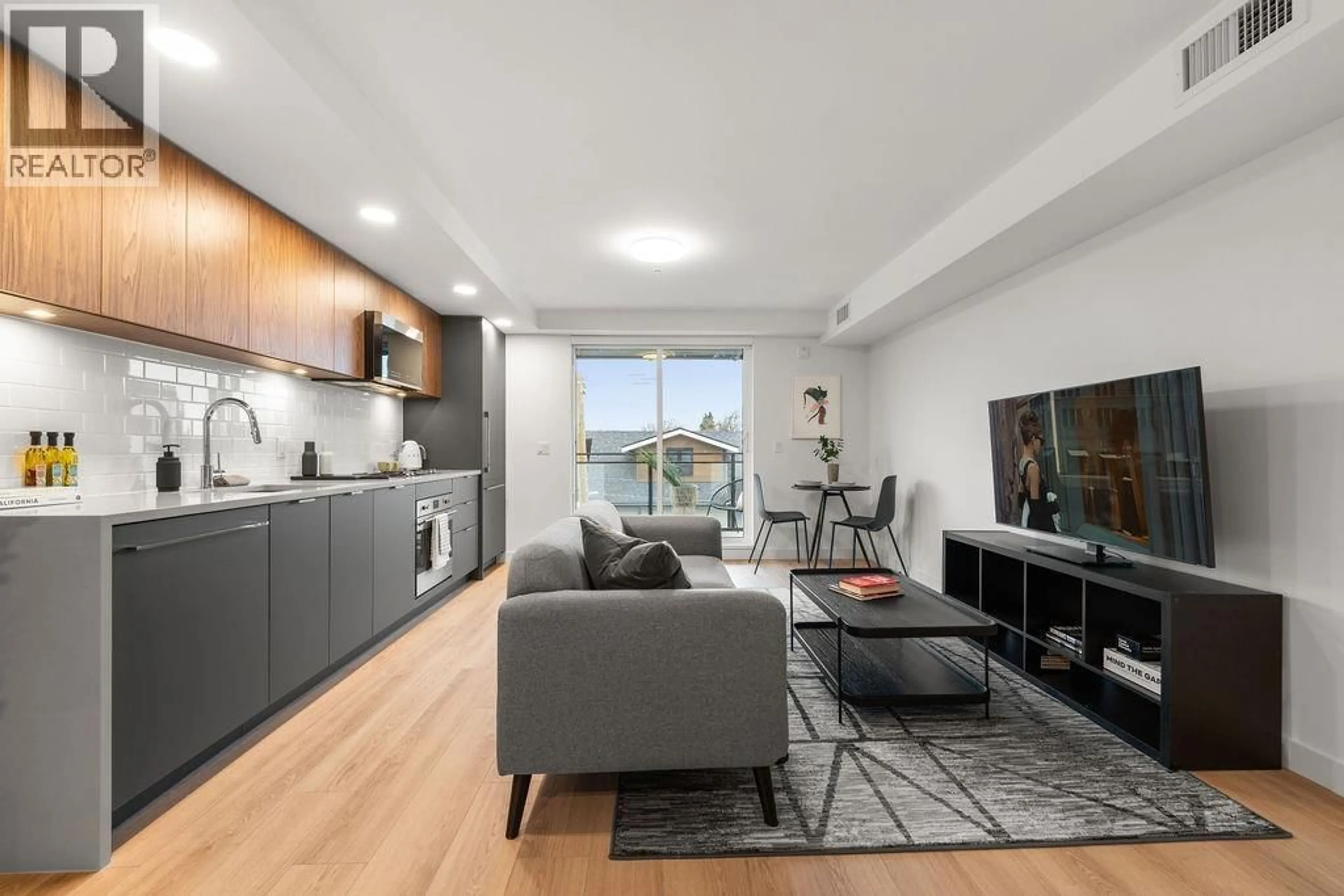 Living room with furniture, unknown for 307 - 2419 GRANT STREET, Vancouver British Columbia V5K3G5
