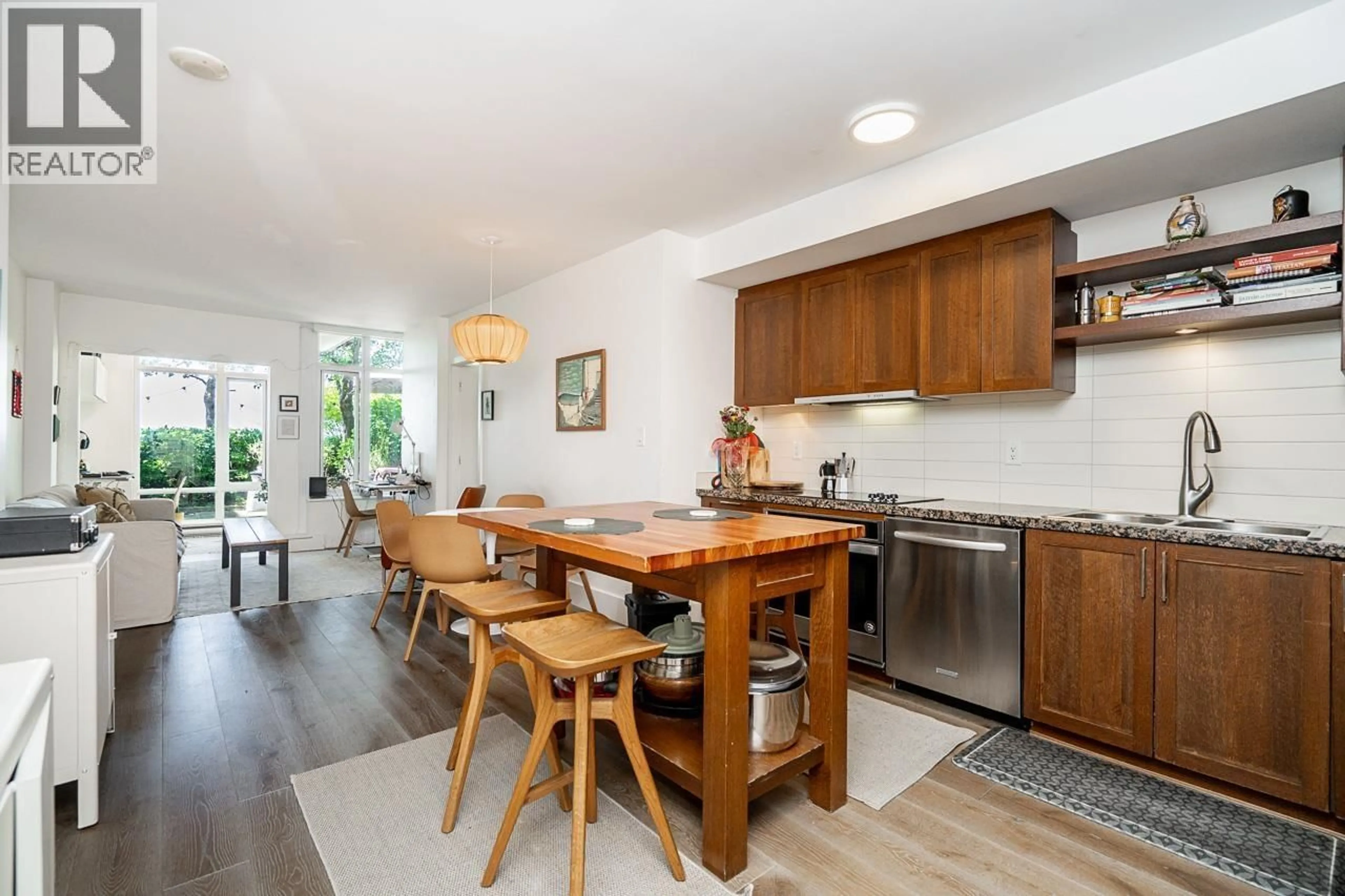 Open concept kitchen, wood/laminate floor for 331 - 2288 BROADWAY, Vancouver British Columbia V6K0B3